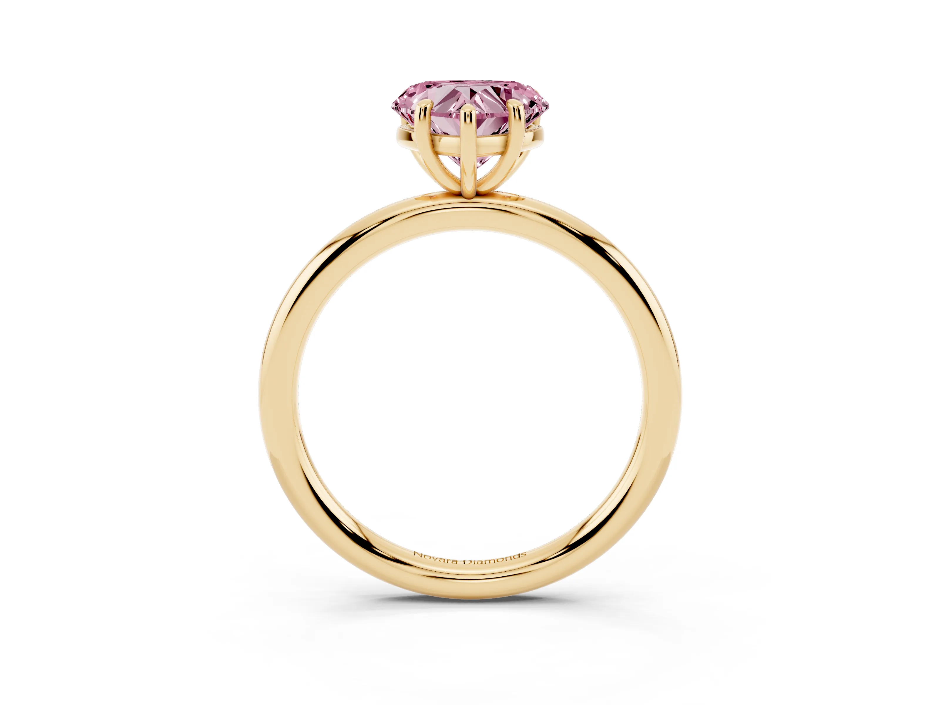 Fancy Pink Heart Cut Diamond Solitaire Ring Set in Yellow gold with Prong Setting on a Polished Plain Band