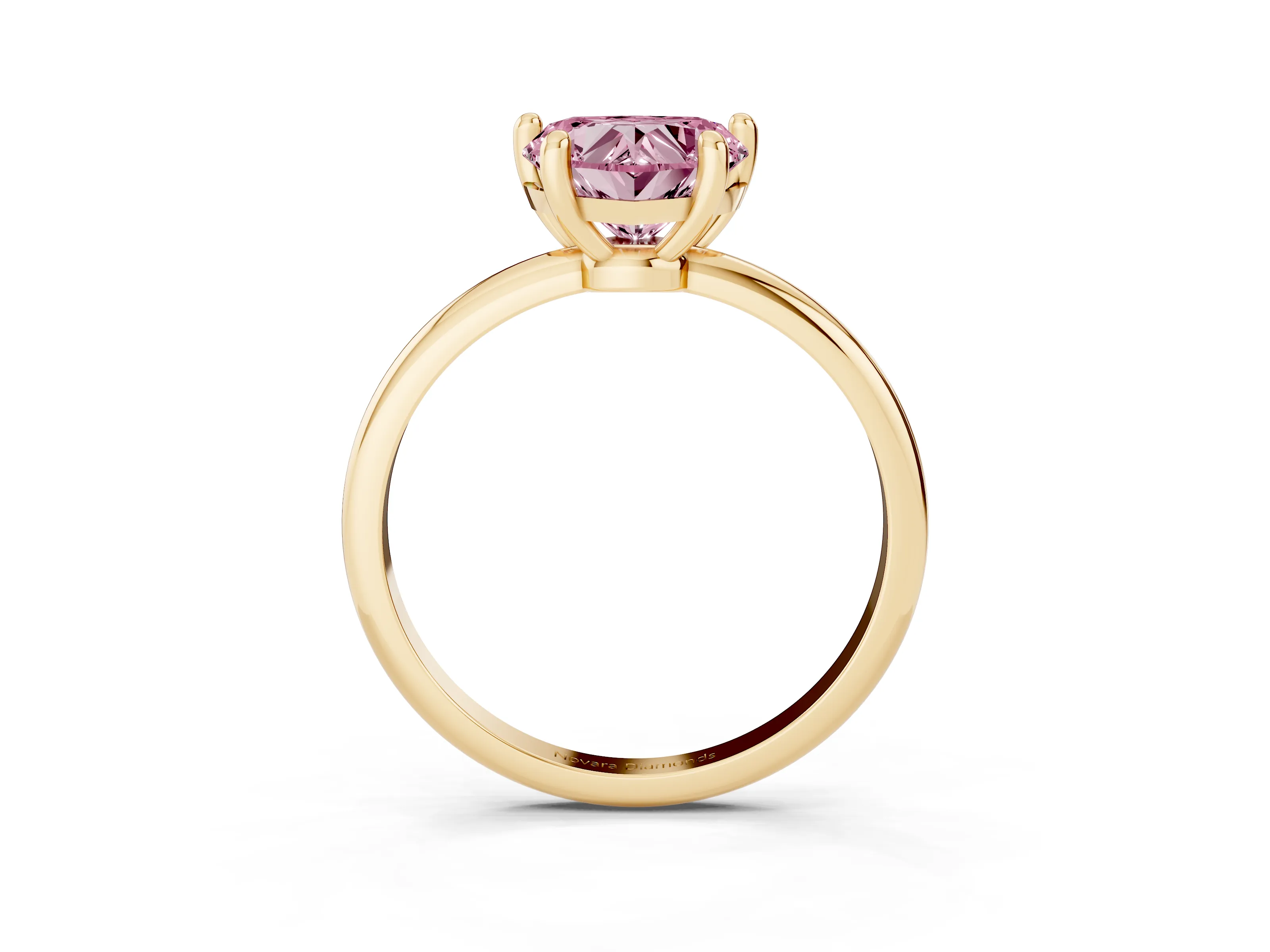 Fancy Pink Heart Cut Diamond Solitaire Ring Set in Yellow gold with Secure Prong Setting on a Classic Band