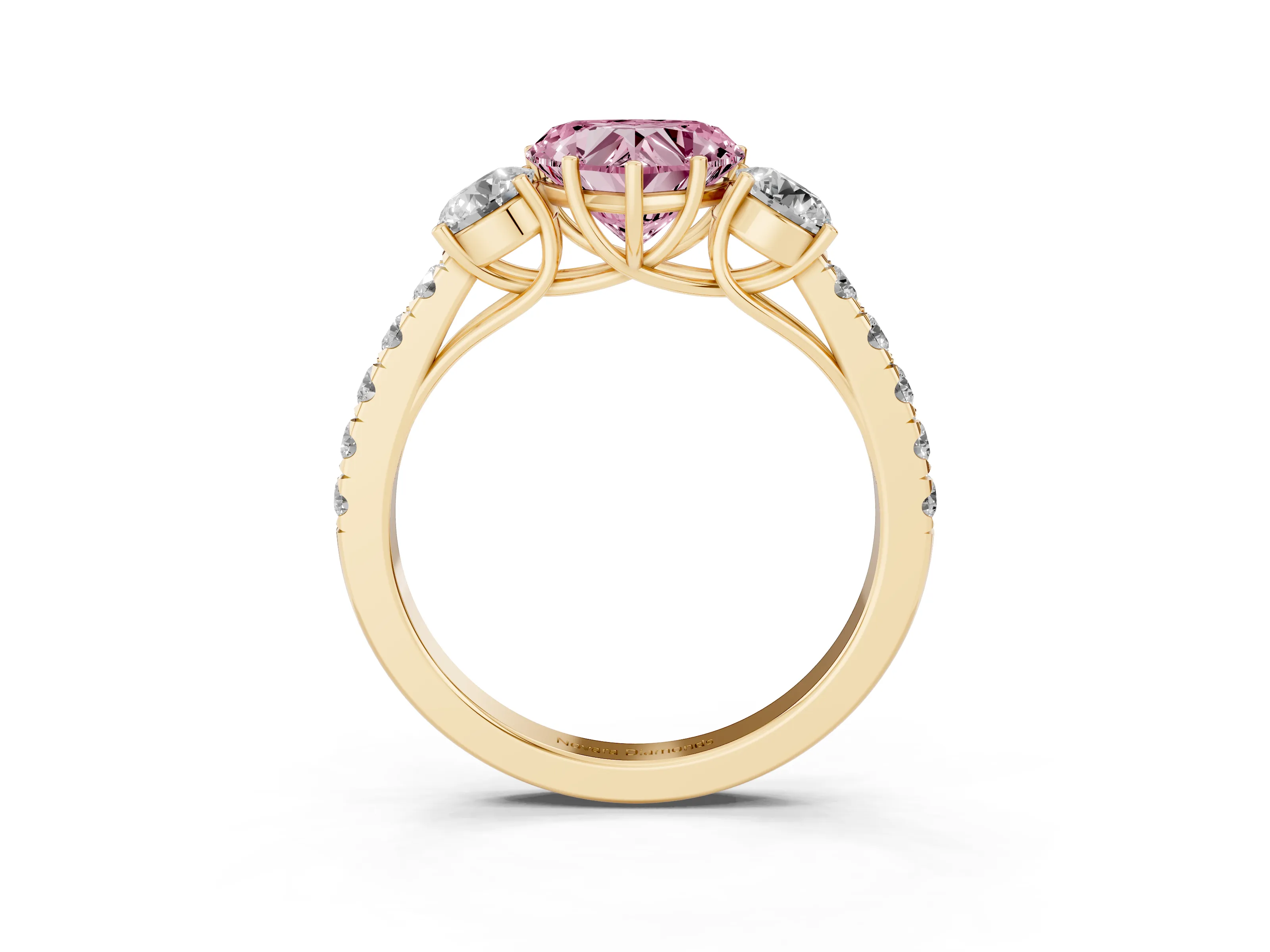 Fancy Pink Heart Cut Diamond Three-Stone Ring Set in Yellow gold with Round Side Stones and Delicate Pavé Band