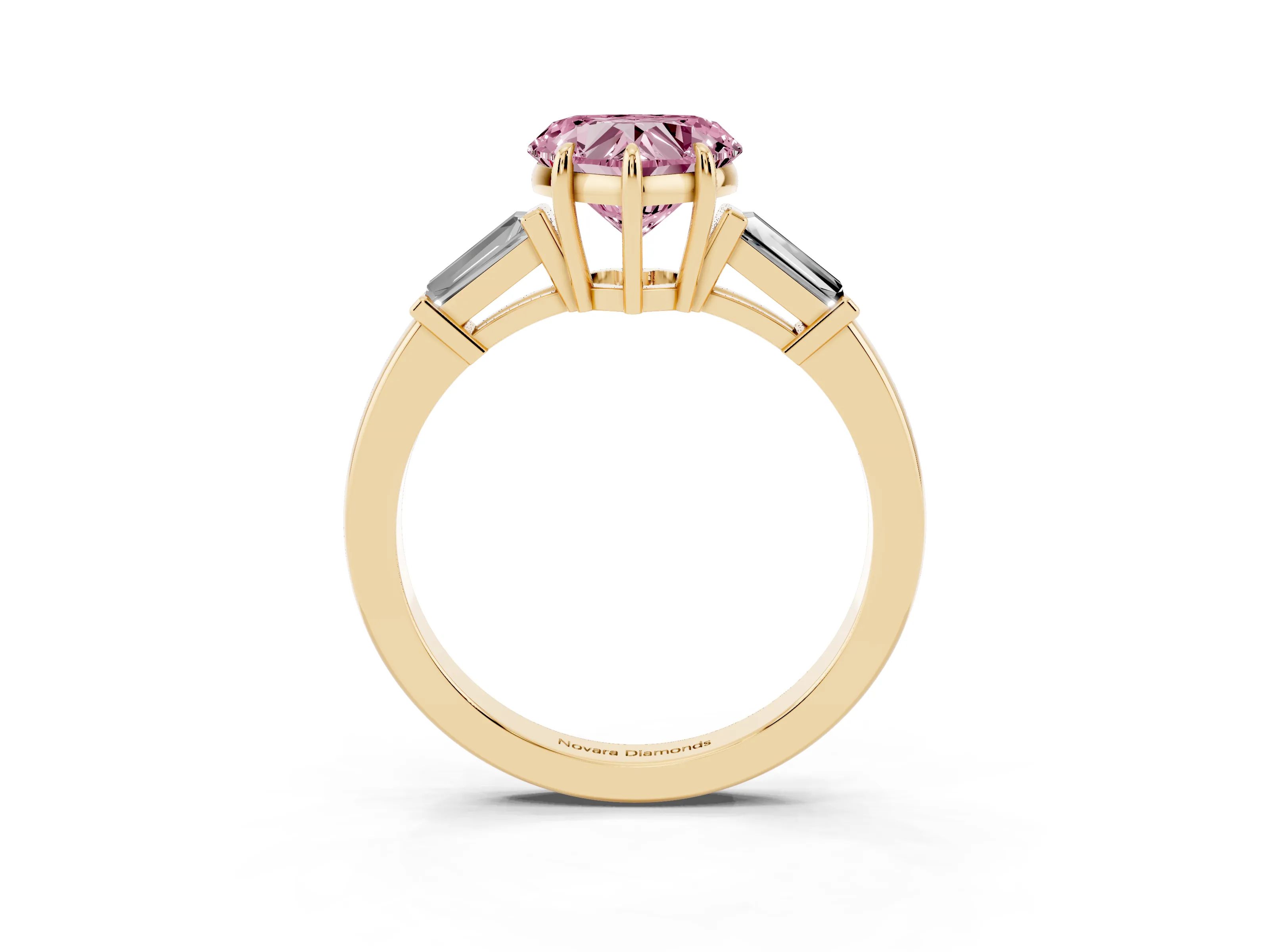 Fancy Pink Heart Cut Diamond Three-Stone Ring Set in Yellow gold with Tapered Baguette Side Stones and Prong Setting