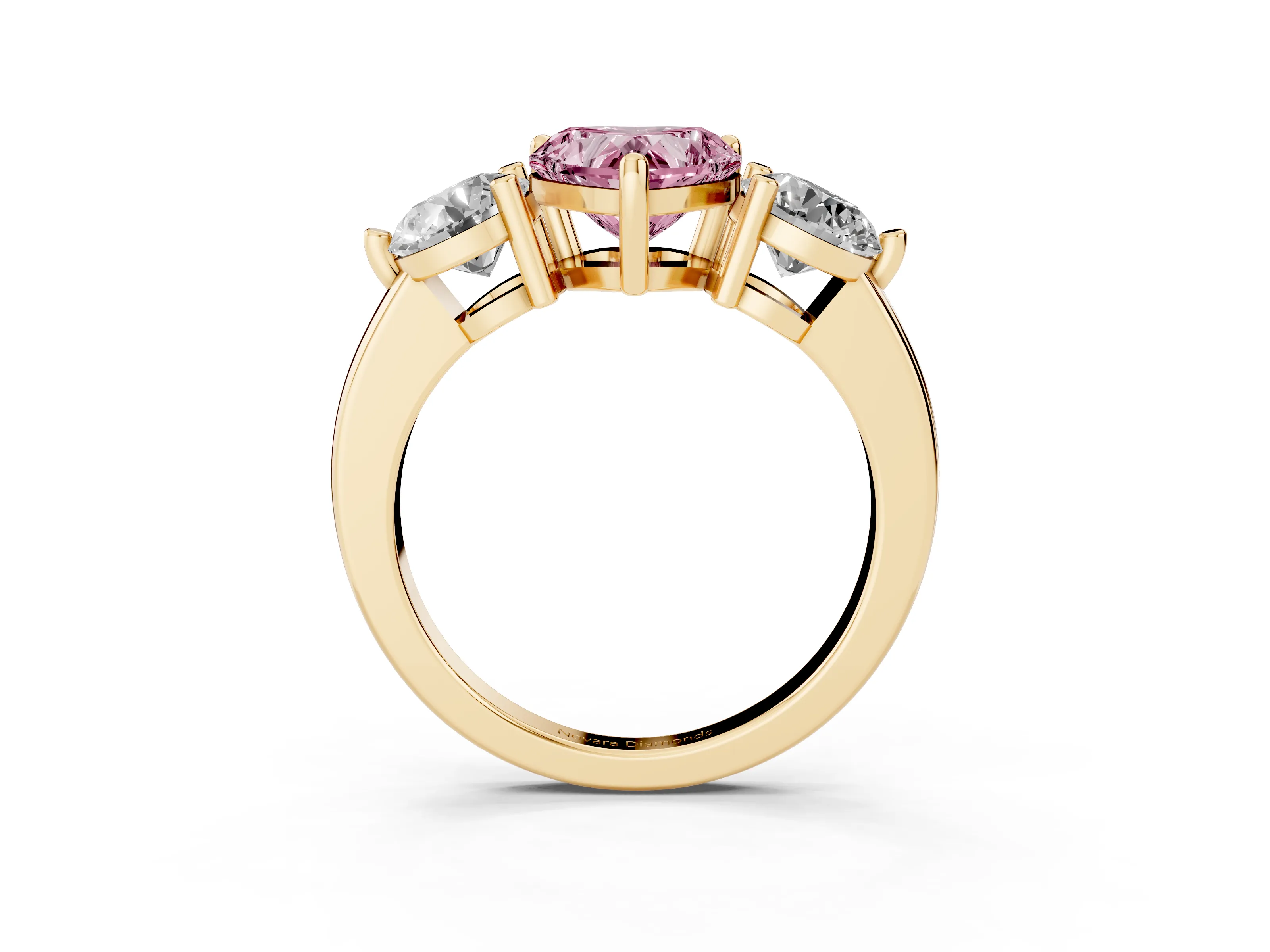 Fancy Pink Heart Cut Diamond Three-Stone Ring Set in Yellow gold with Prong Setting and Classic Band