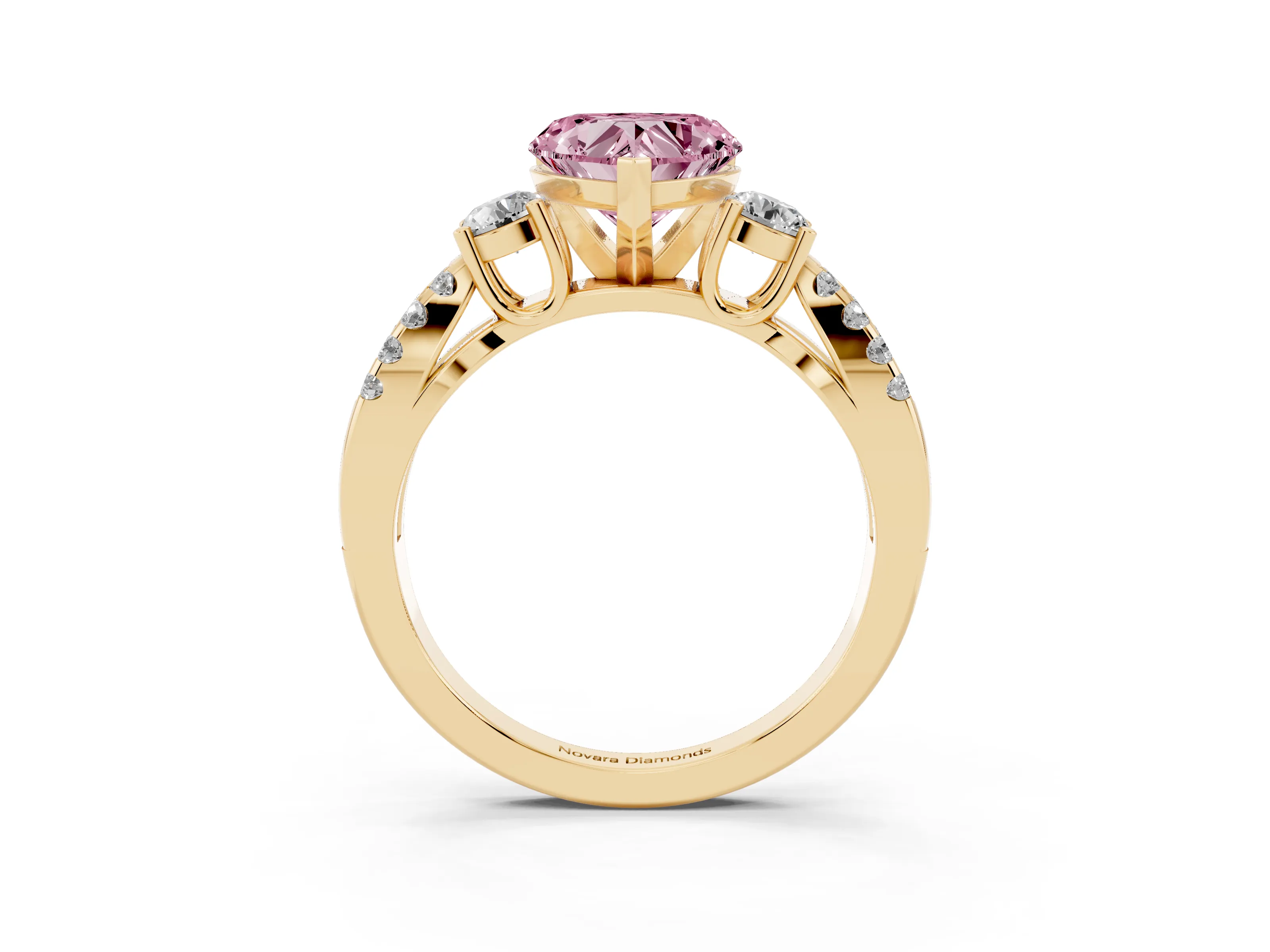 Fancy Pink Heart Cut Diamond Three-Stone Ring Set in Yellow gold with Pavé Split Shank and Prong Setting