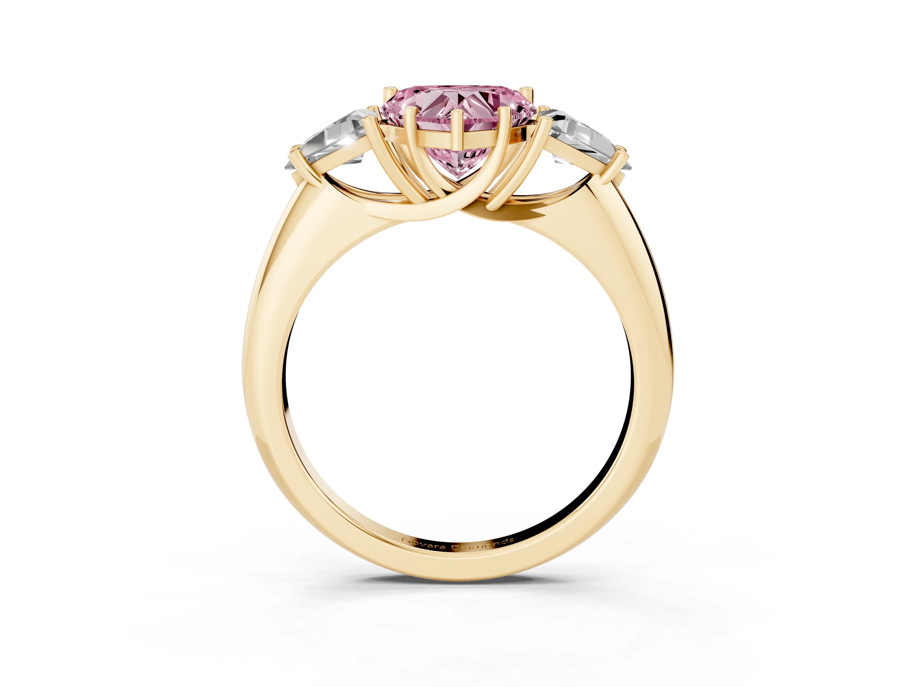 Fancy Pink Heart Cut Diamond Three-Stone Engagement Ring Set in Yellow gold with Trillion Side Stones