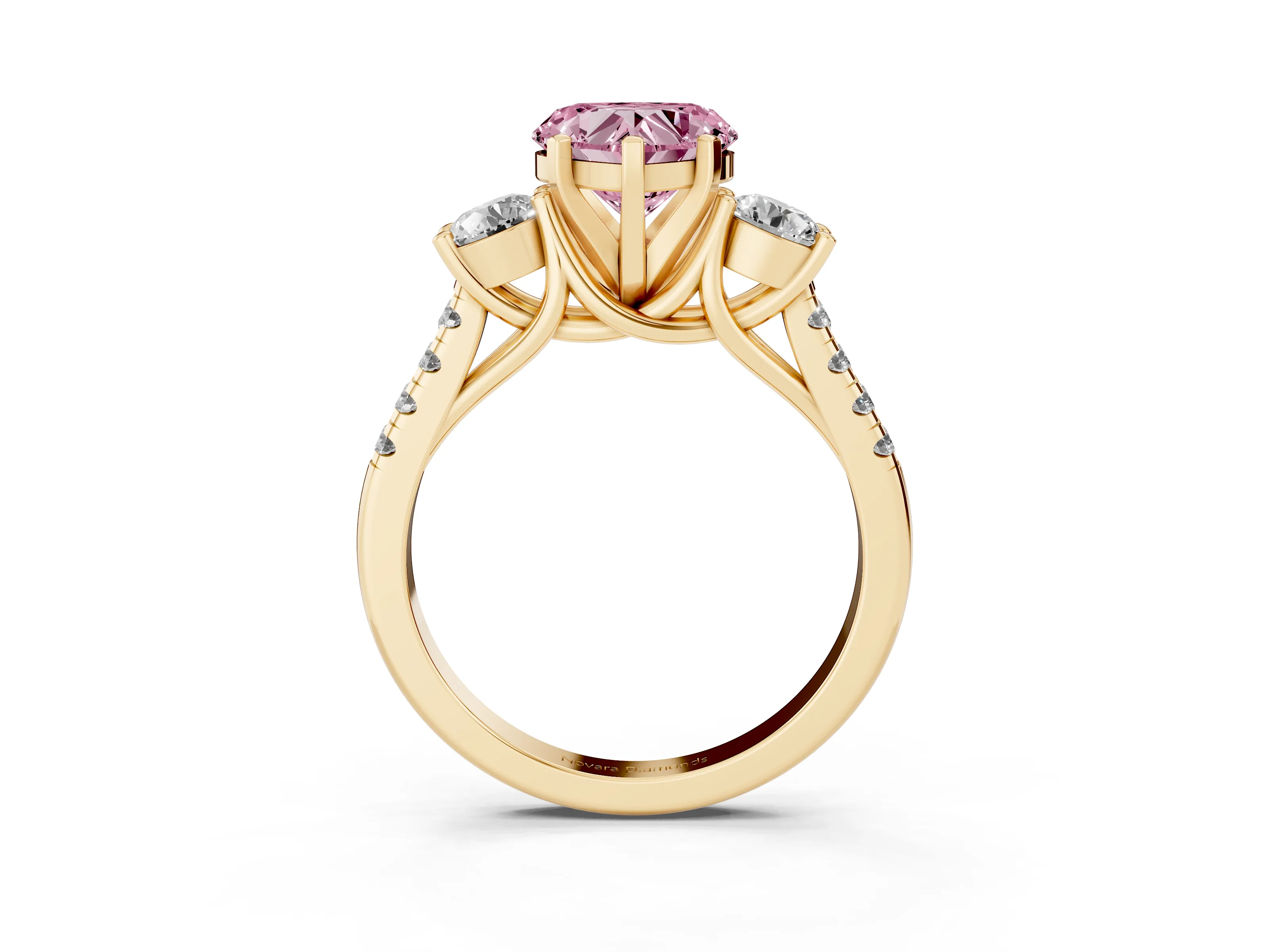 Fancy Pink Three-Stone Heart Cut Diamond Pavé Band Ring Set in Yellow gold with Prong-Set Trio