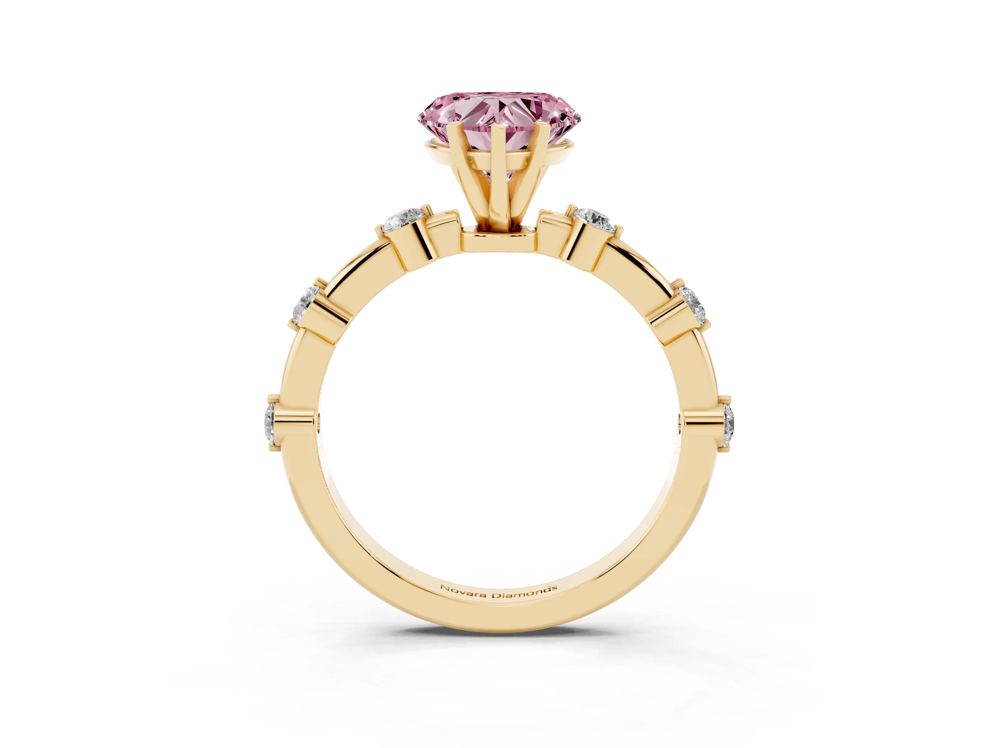 Fancy Pink Heart Cut Diamond Solitaire Ring Set in Yellow gold with Bezel Set Side Stones and Prong Setting