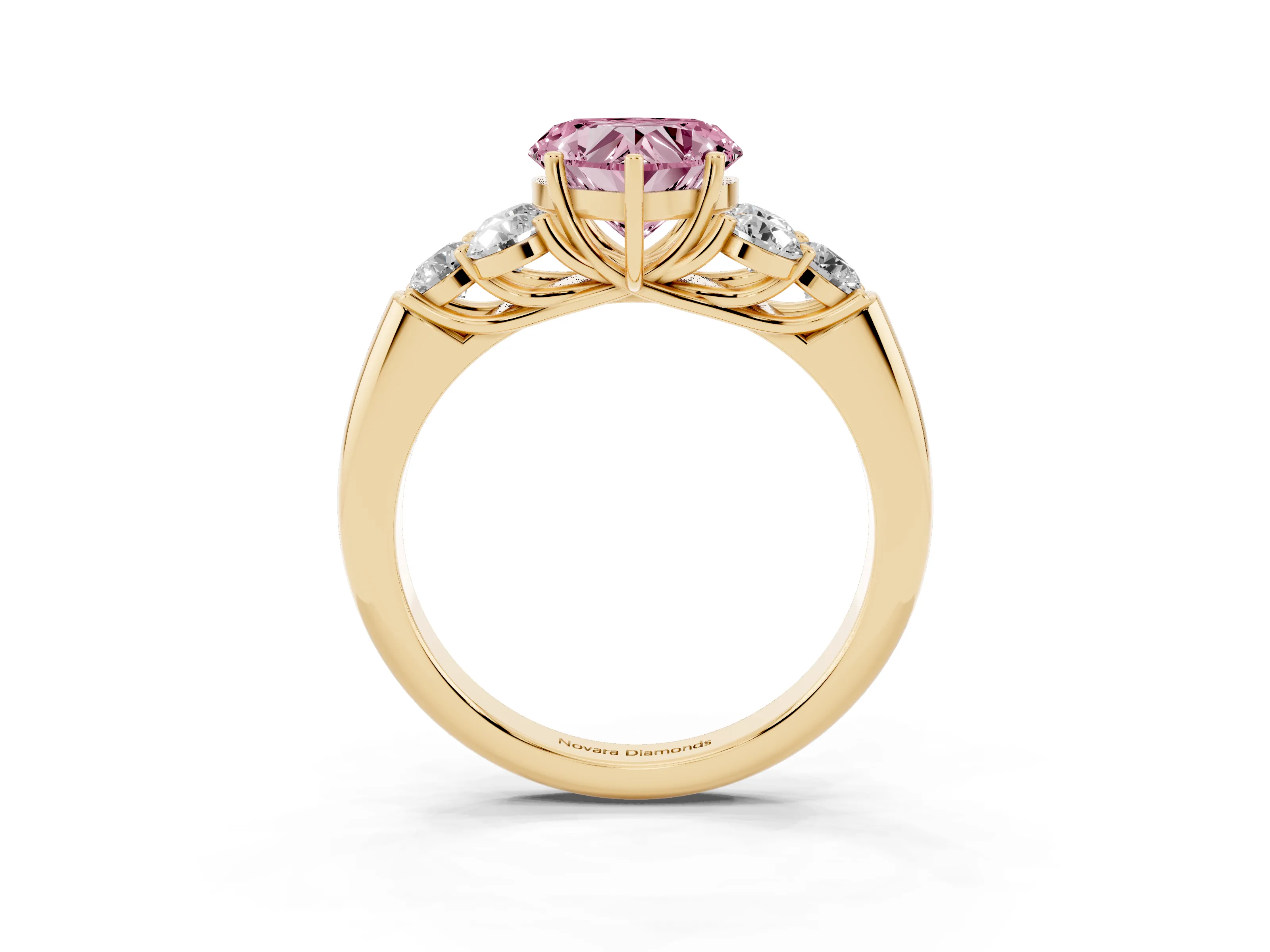 Fancy Pink Heart Cut Diamond Cluster Ring Set in Yellow gold with Round Accent Stones and Prong Setting on a Plain Band