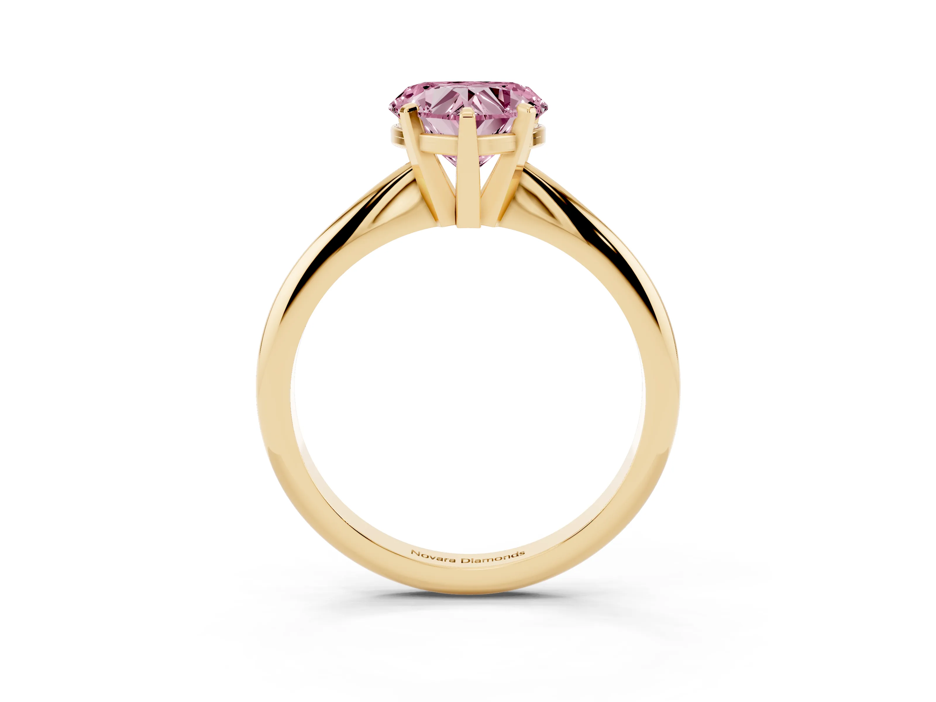 Fancy Pink Heart Cut Diamond Solitaire Ring Set in Yellow gold with Prong Setting on a Plain Round Band