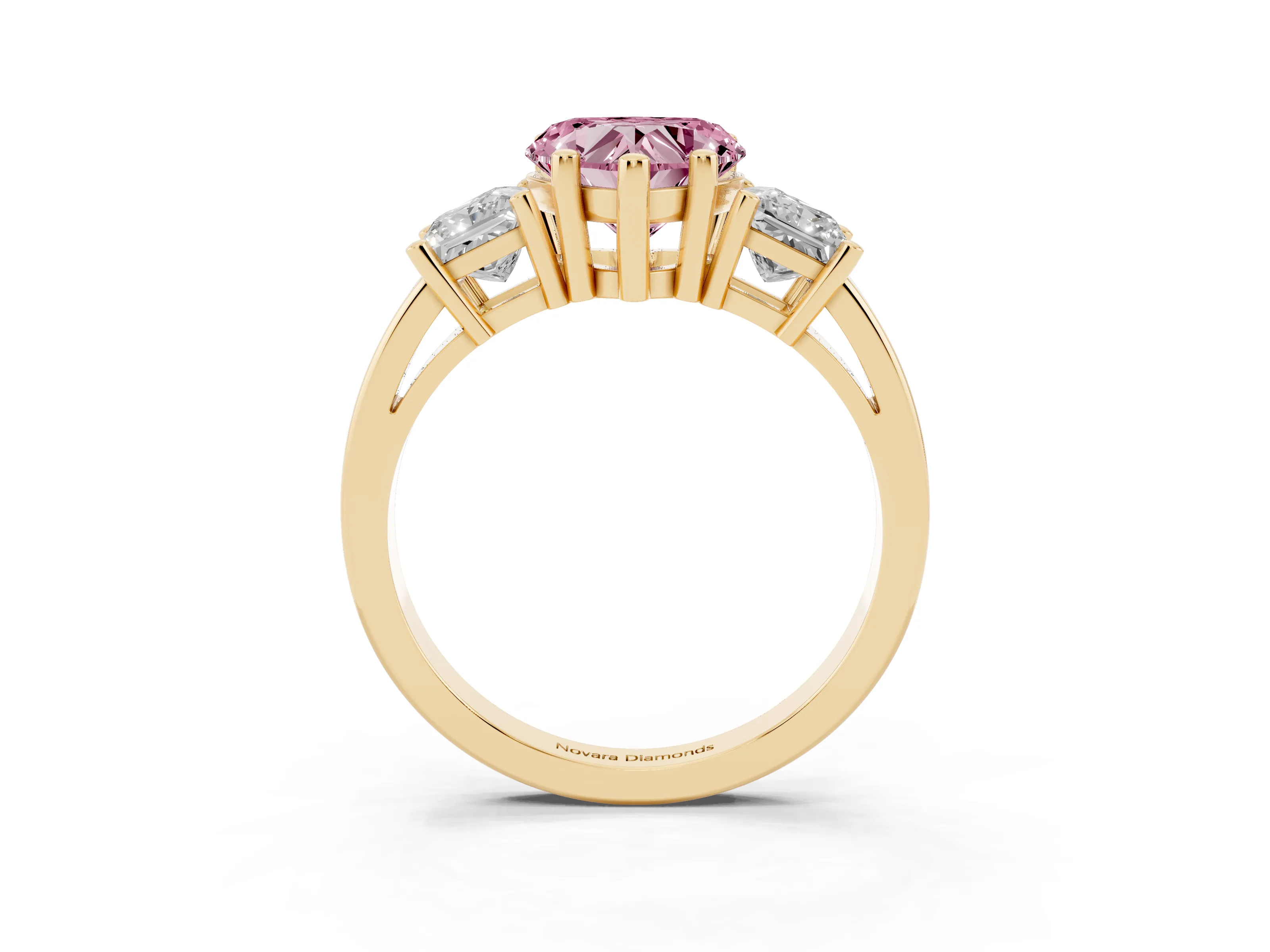 Fancy Pink Three-Stone Heart Cut Diamond Solitaire Ring Set in Yellow gold with Prong Setting