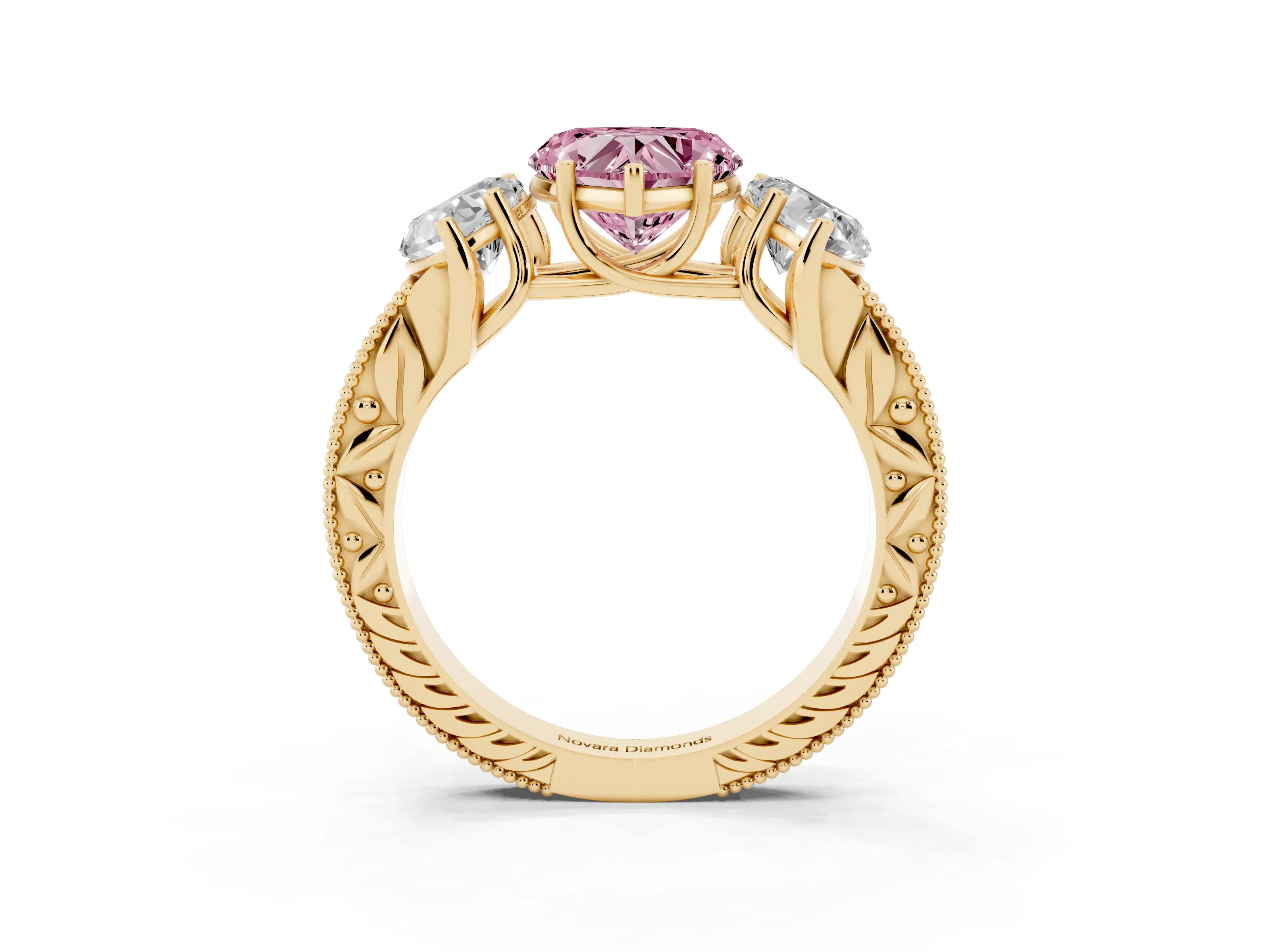 Fancy Pink Heart Cut Diamond Three-Stone Engagement Ring Set in Yellow gold with Milgrain Pavé Band