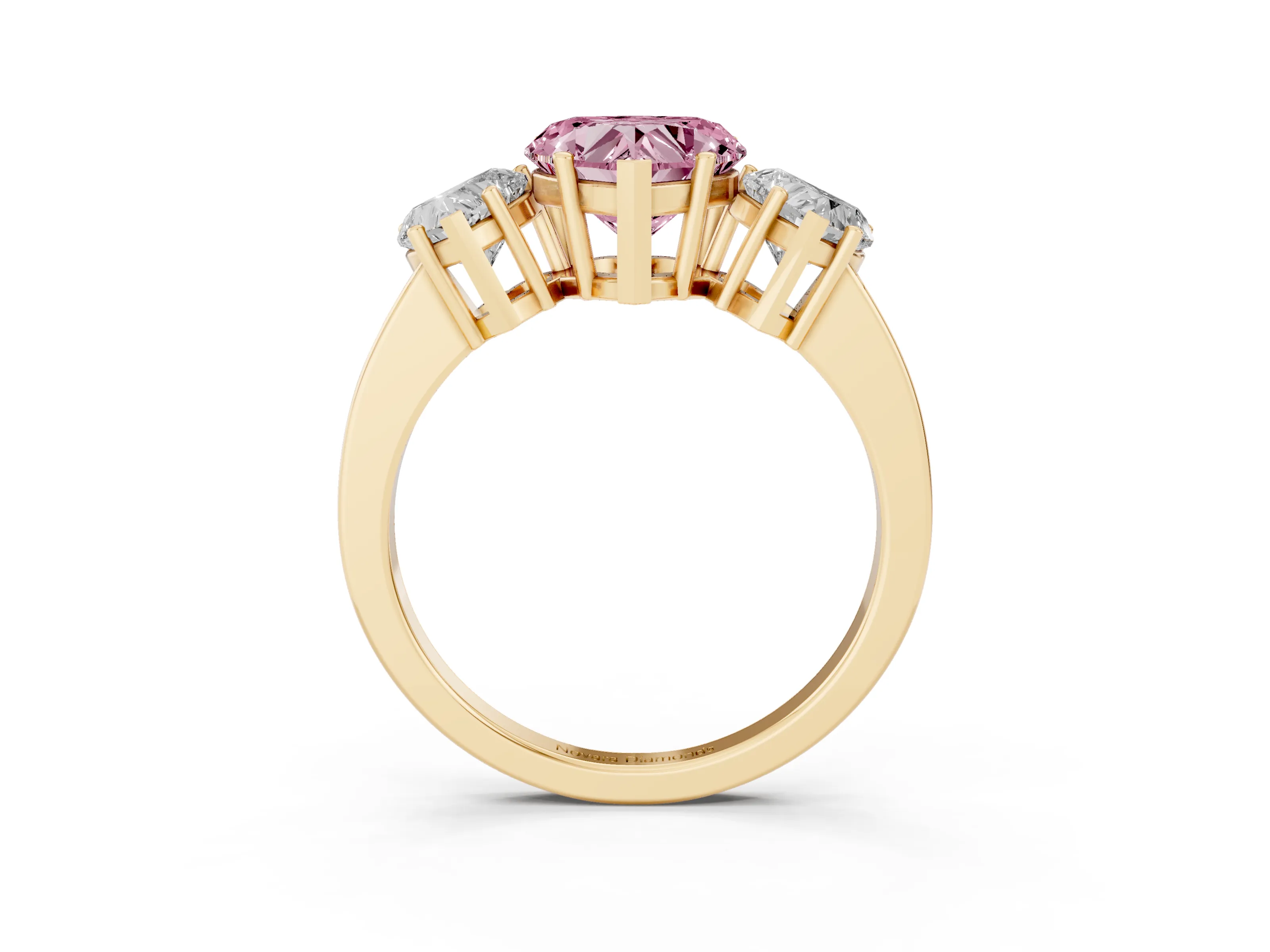 Fancy Pink Heart Cut Diamond Three-Stone Engagement Ring Set in Yellow gold with Flat Band