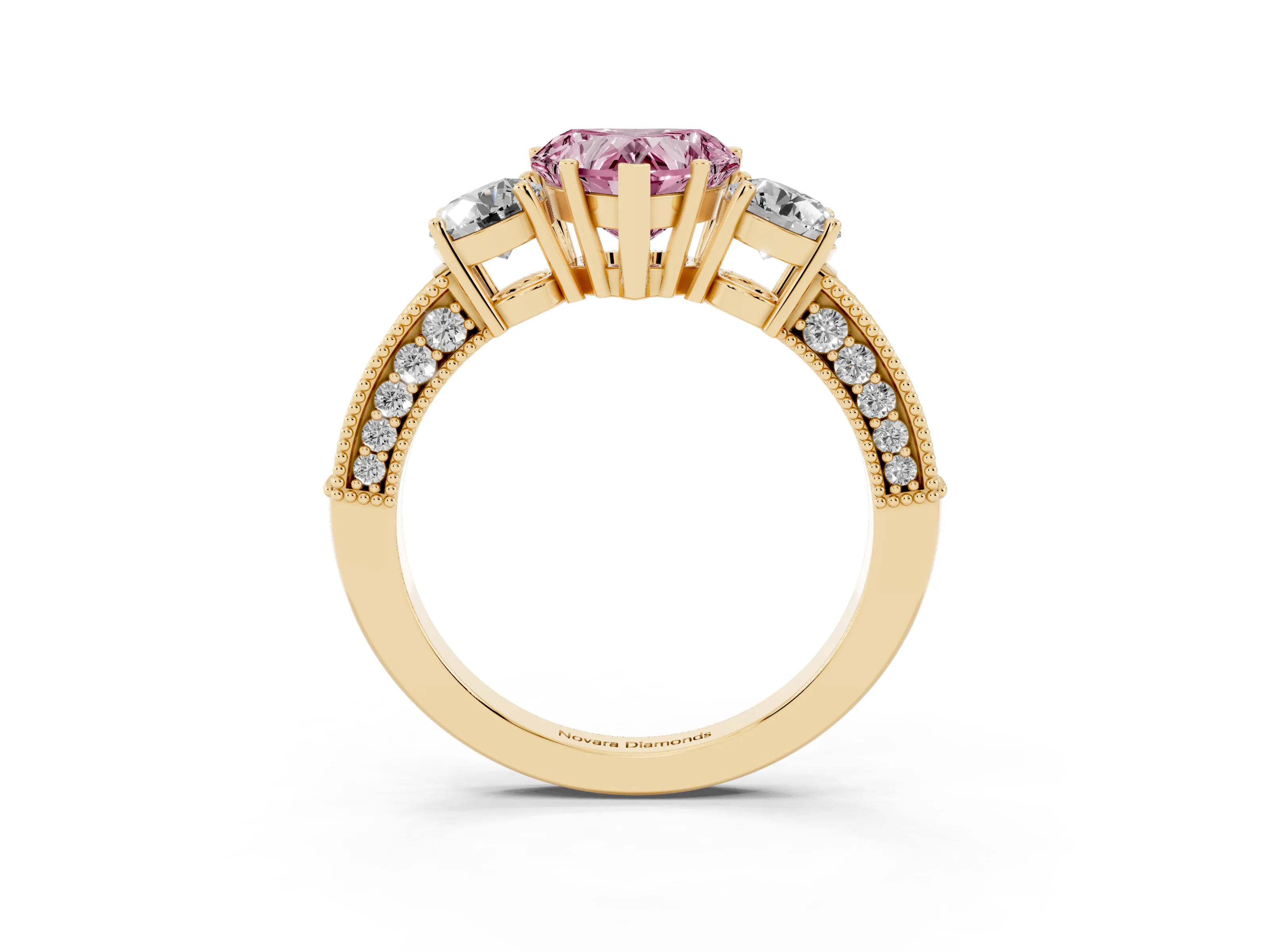 Fancy Pink Heart Cut Diamond Three-Stone Ring Set in Yellow gold with Round Side Stones and Pavé Band