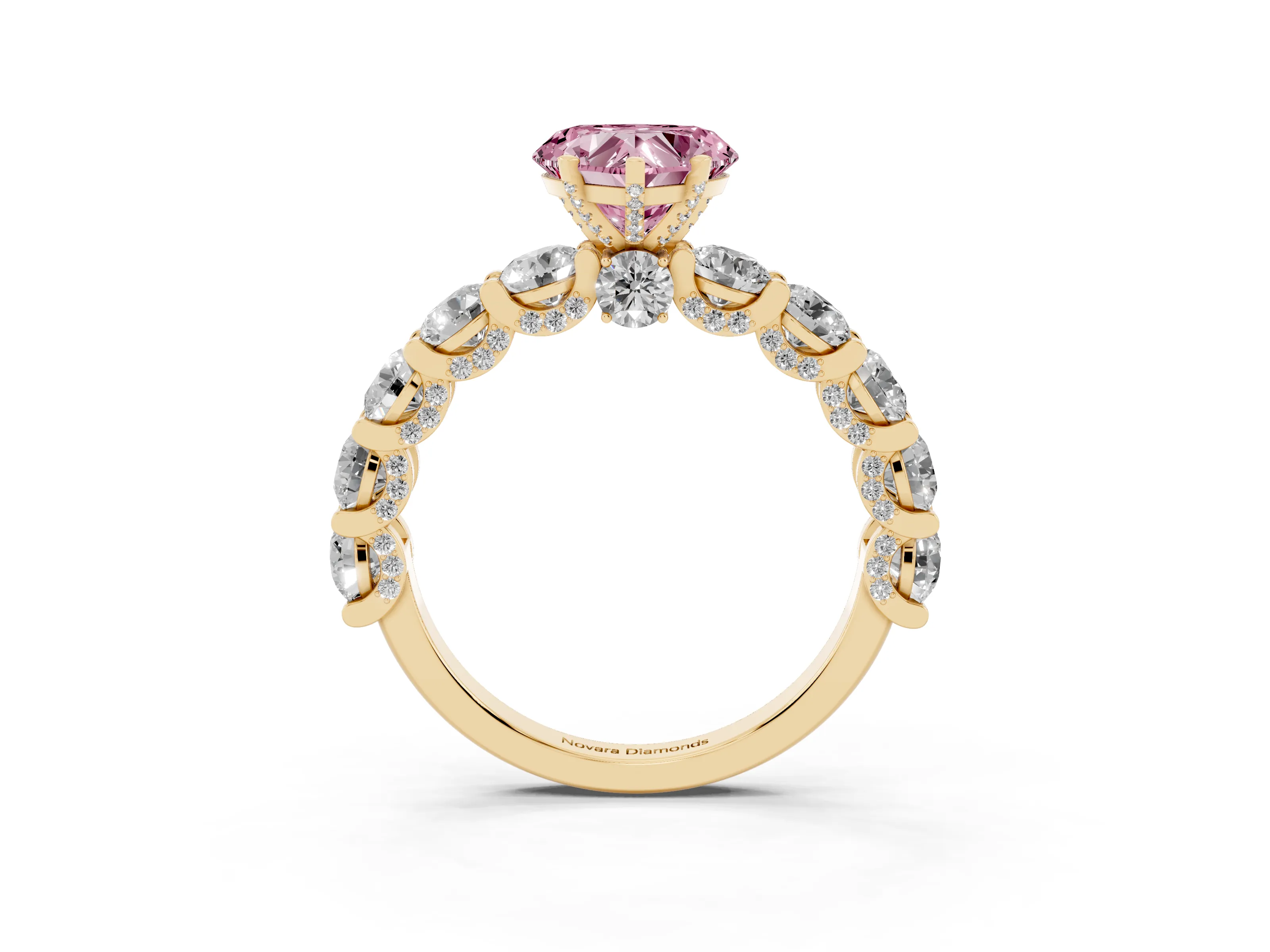 Fancy Pink Heart Cut Diamond Side Stone Ring Set in Yellow gold with Alternating Round and Oval Side Stones