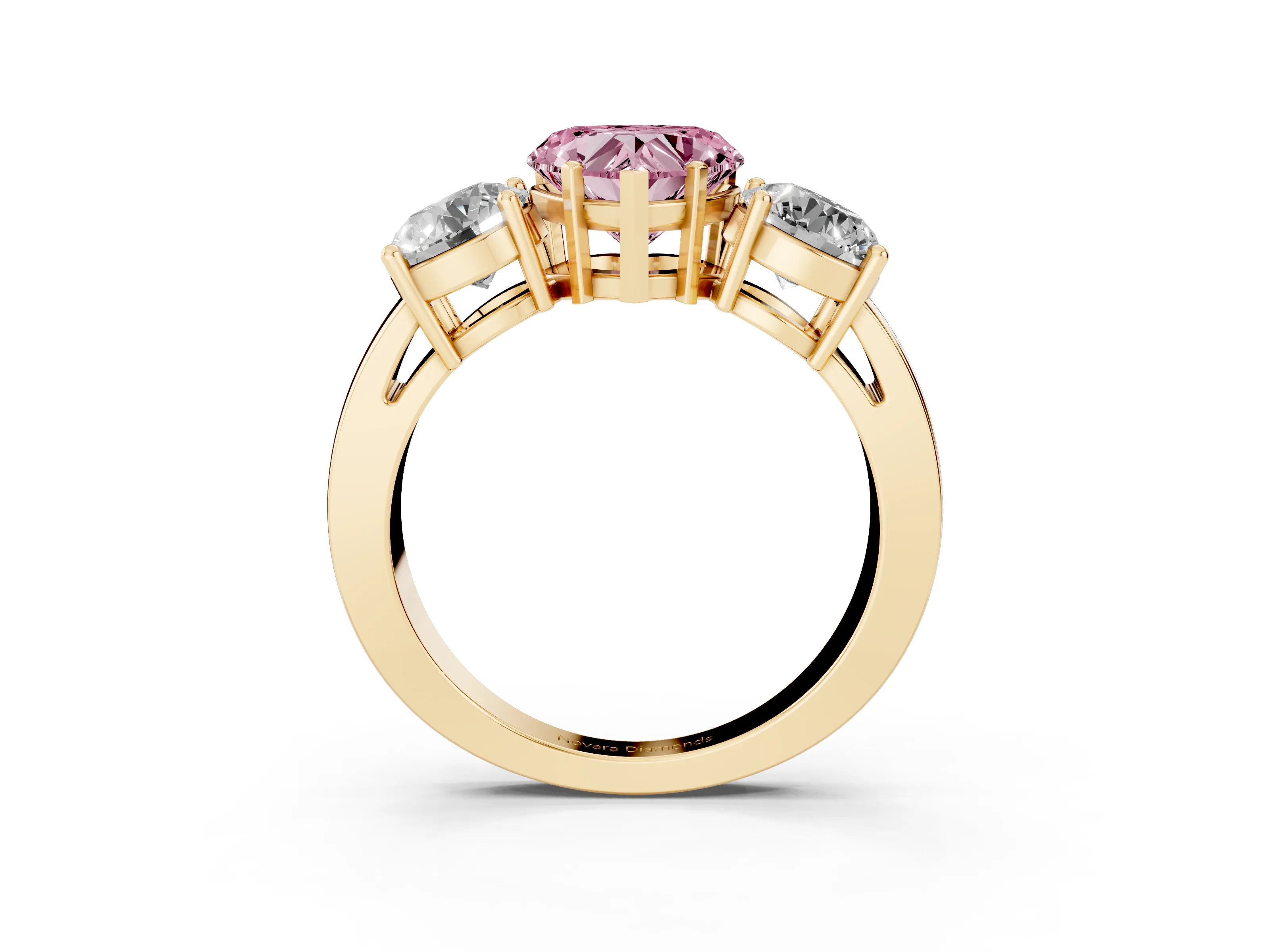 Fancy Pink Heart Cut Diamond Three-Stone Ring Set in Yellow gold with Round Side Stones and Classic Band