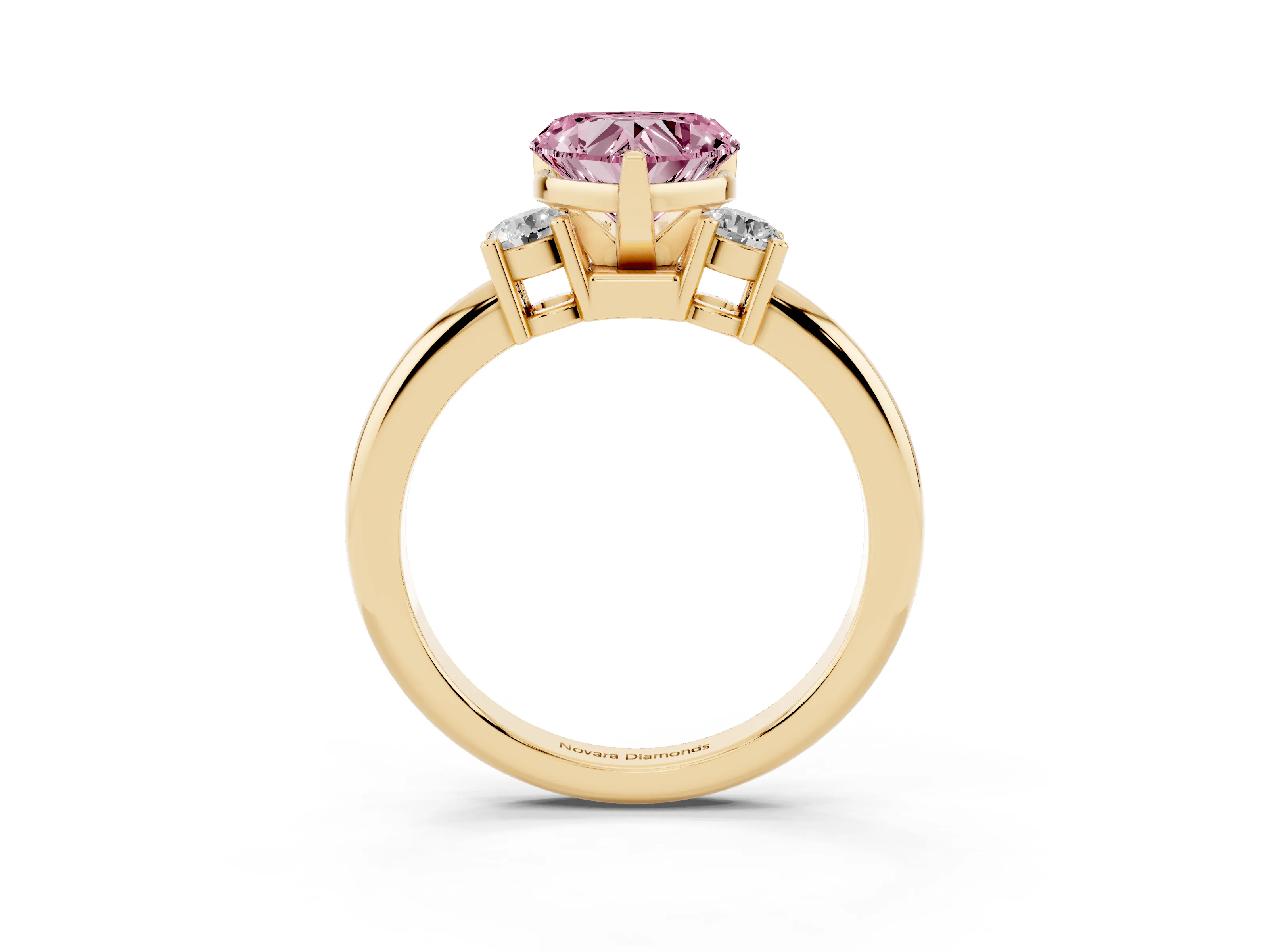 Fancy Pink Three-Stone Heart Cut Diamond Ring Set in Yellow gold with Prong Setting and Plain Band