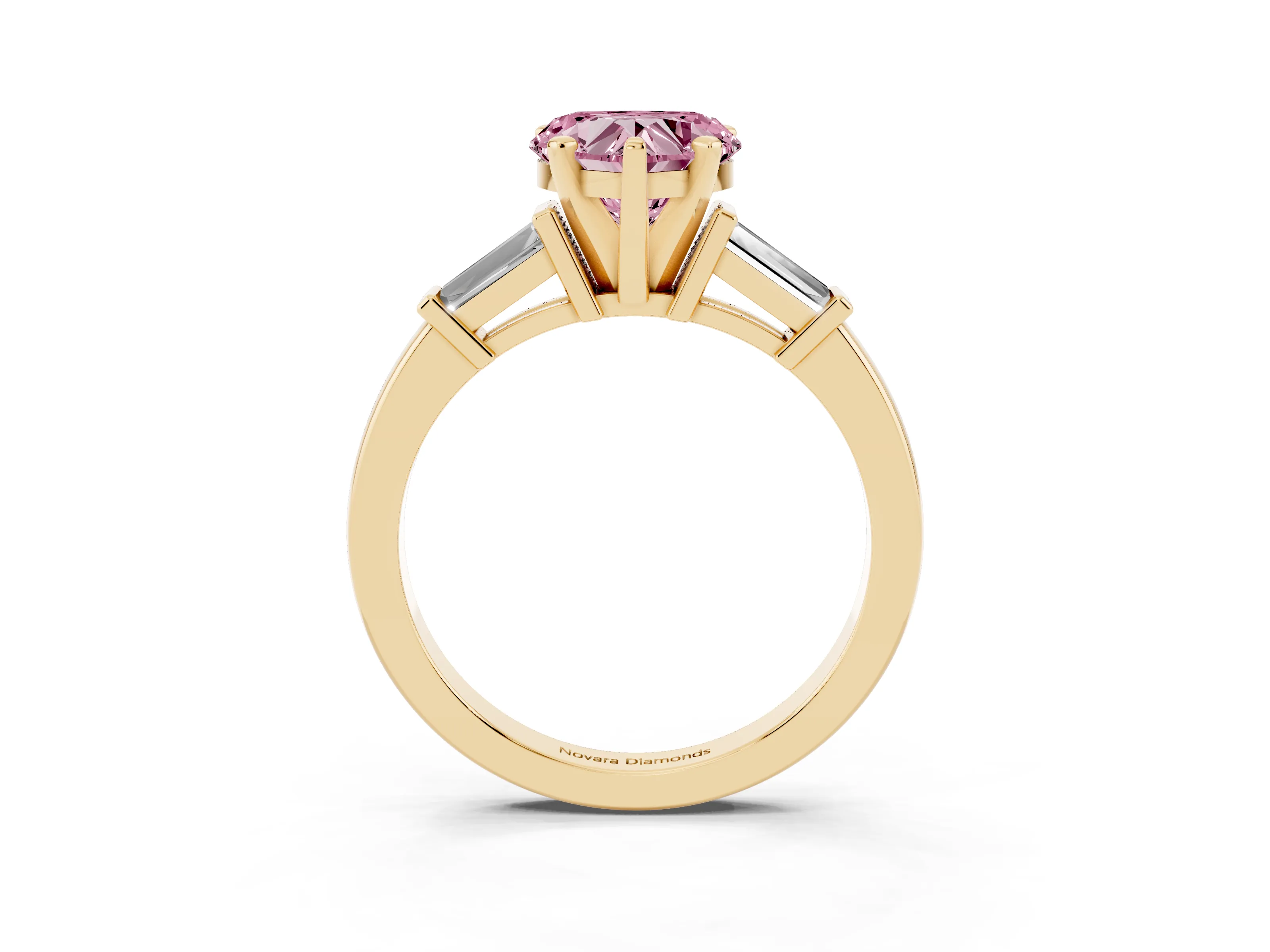 Fancy Pink Heart Cut Diamond Solitaire Ring Set in Yellow gold with Tapered Baguette Accents and Prong Setting