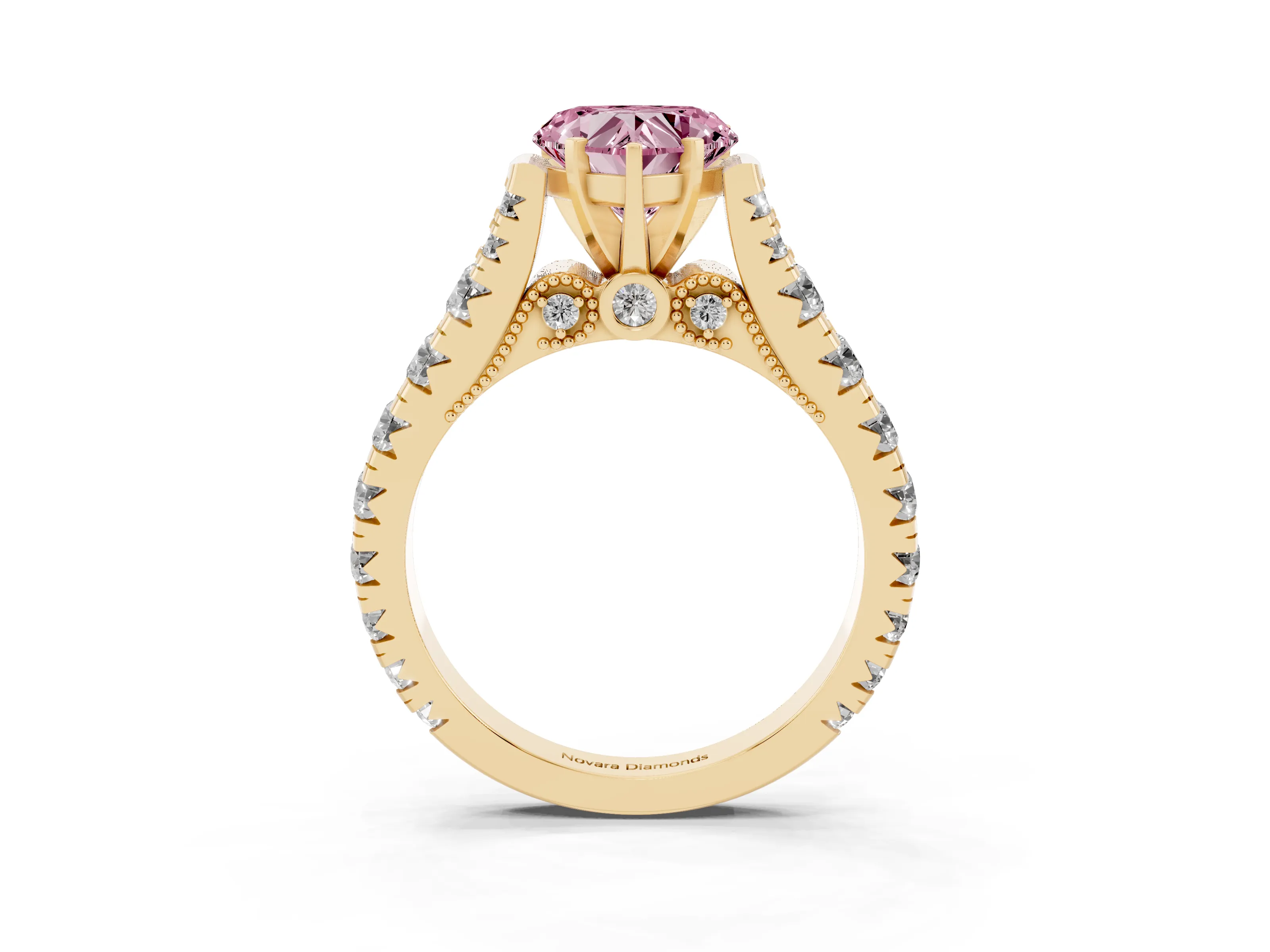 Fancy Pink Heart Cut Diamond Classic Solitaire Ring Set in Yellow gold with Pavé Band and Prong Setting