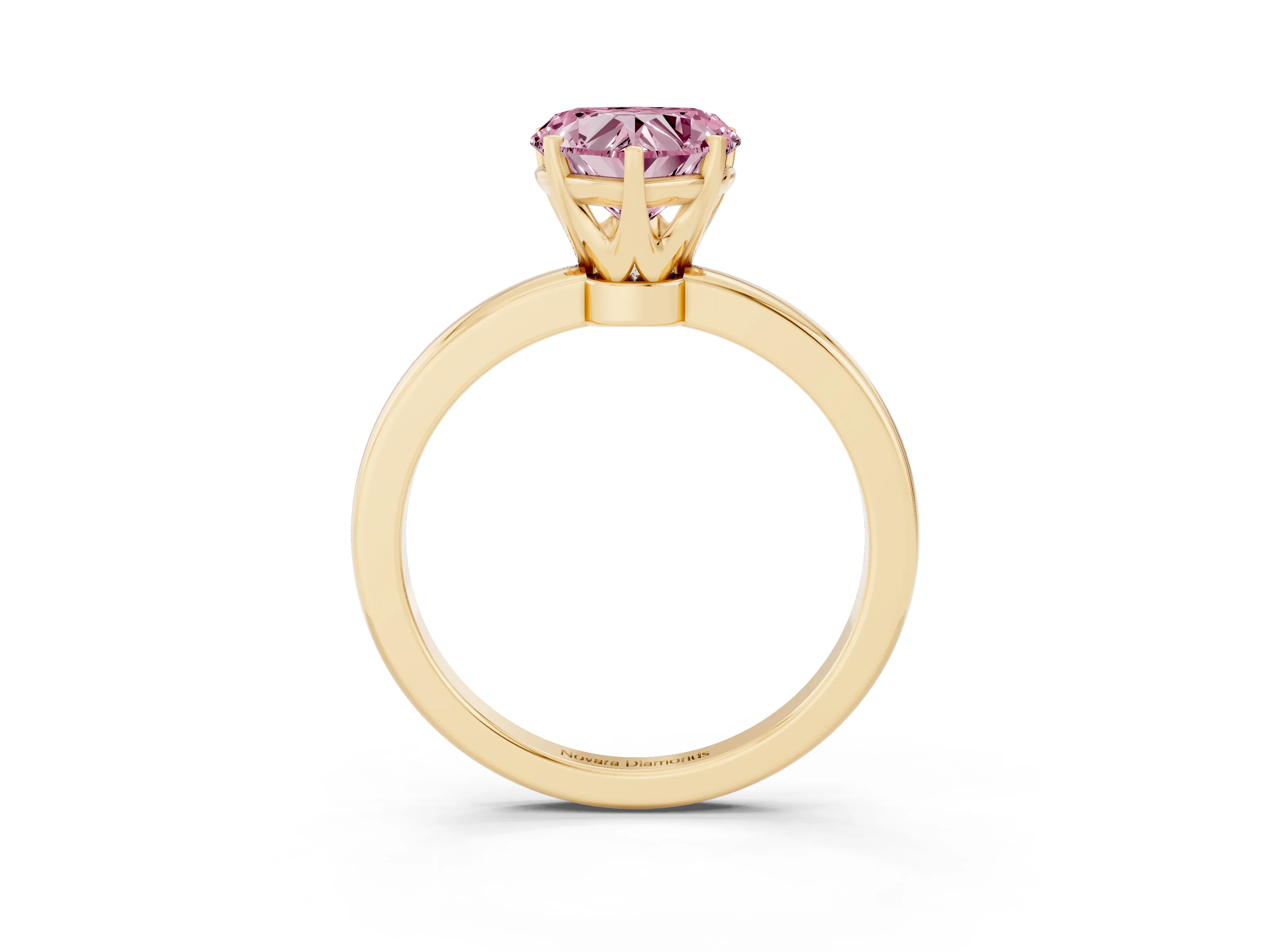 Fancy Pink Heart Cut Diamond Solitaire Ring Set in Yellow gold with Raised Prong Setting on a Classic Band