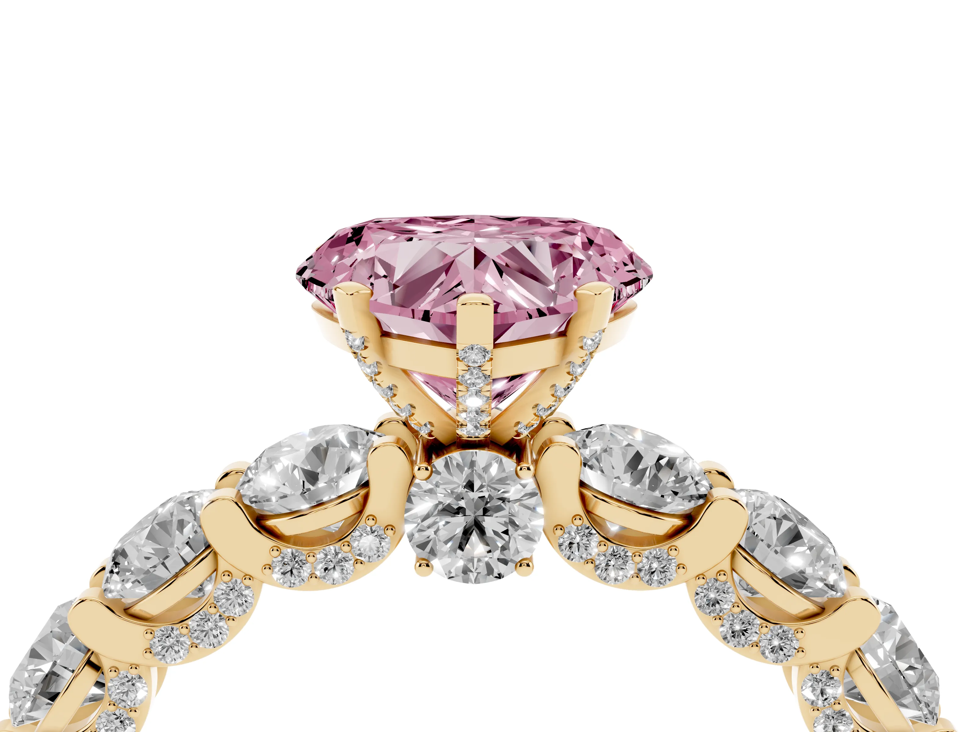 Fancy Pink Heart Cut Diamond Side Stone Ring Set in Yellow gold with Alternating Round and Oval Side Stones