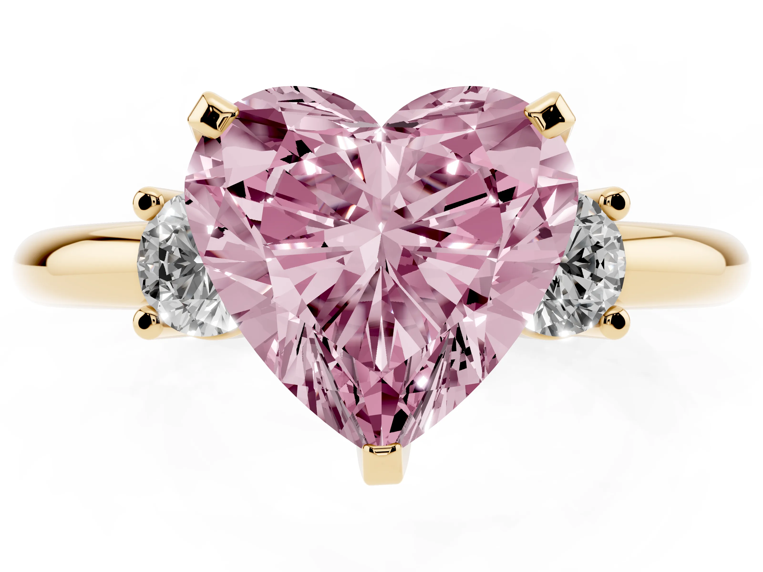 Fancy Pink Three-Stone Heart Cut Diamond Ring Set in Yellow gold with Prong Setting and Plain Band