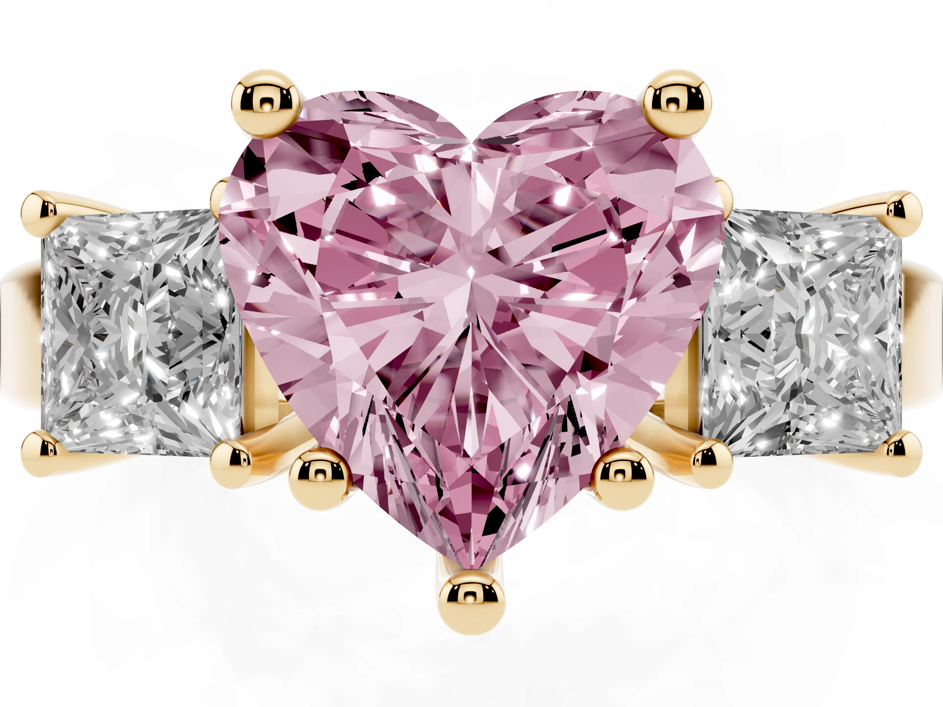 Fancy Pink Three-Stone Heart Cut Diamond Solitaire Ring Set in Yellow gold with Prong Setting