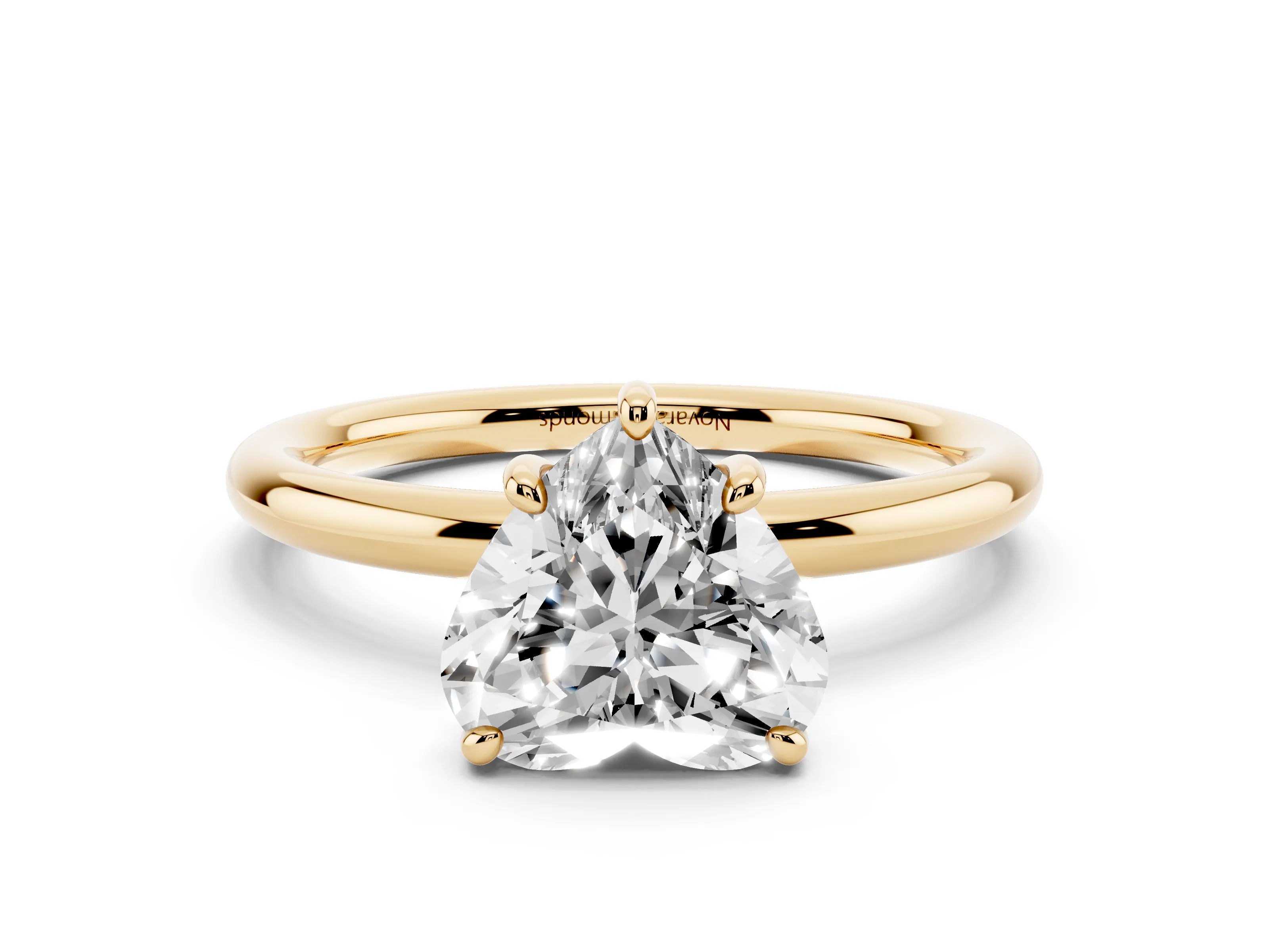 Heart Cut Diamond Solitaire Ring Set in Yellow gold with Prong Setting on a Polished Plain Band