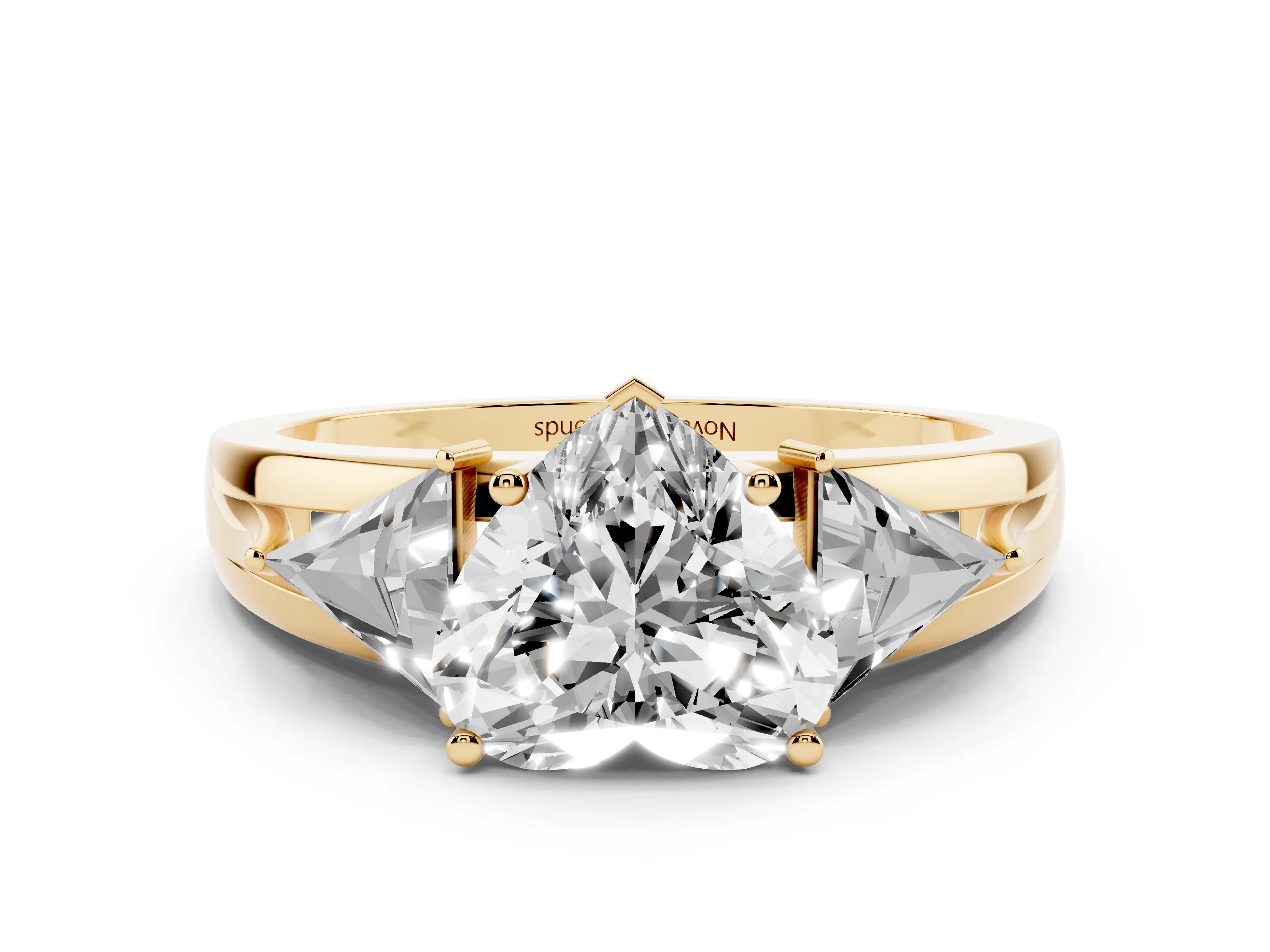 Heart Cut Diamond Three-Stone Ring Set in Yellow gold with Trillion Side Stones and Split Shank
