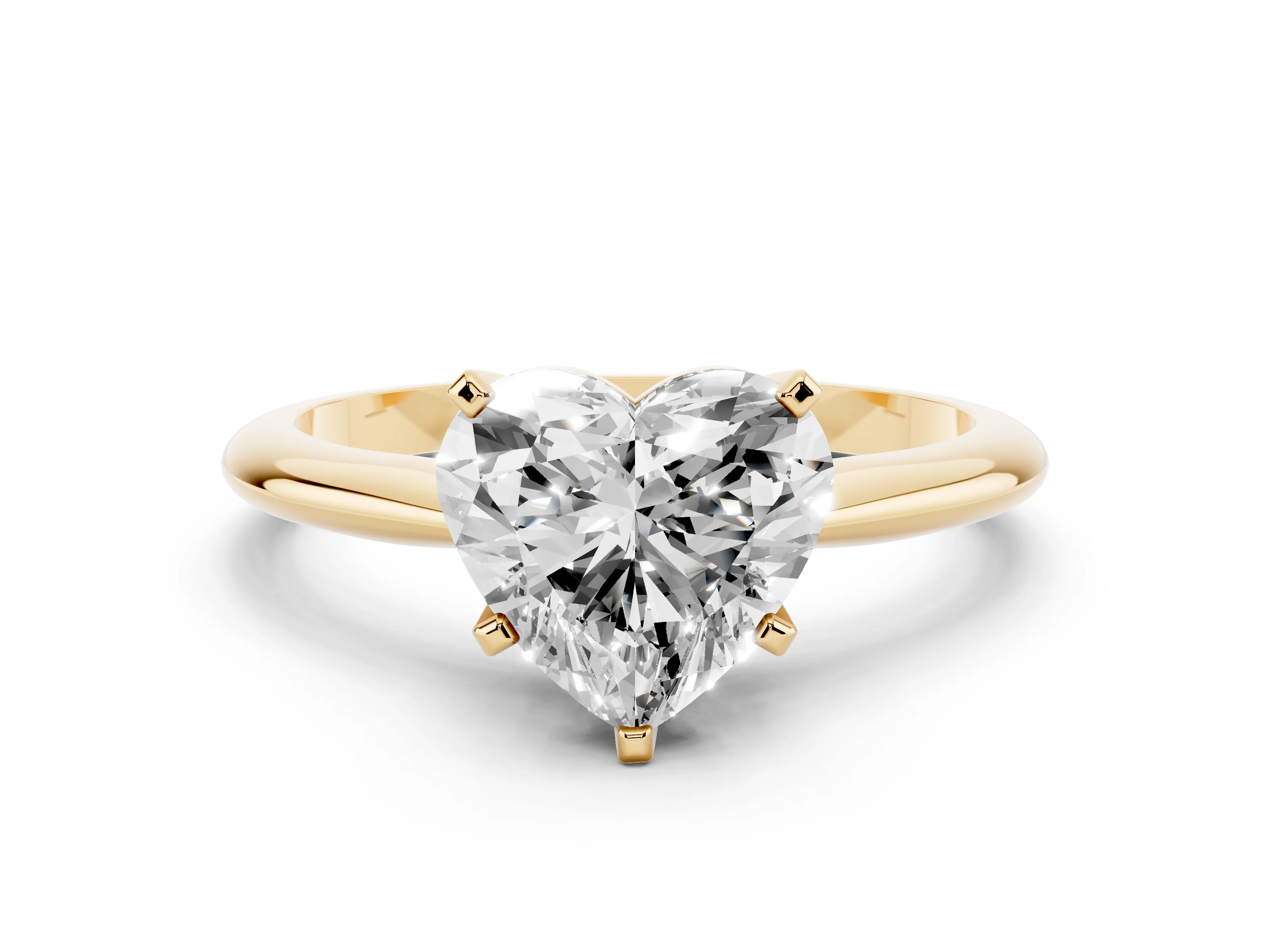 Heart Cut Diamond Solitaire Ring Set in Yellow gold with Prong Setting on a Plain Round Band