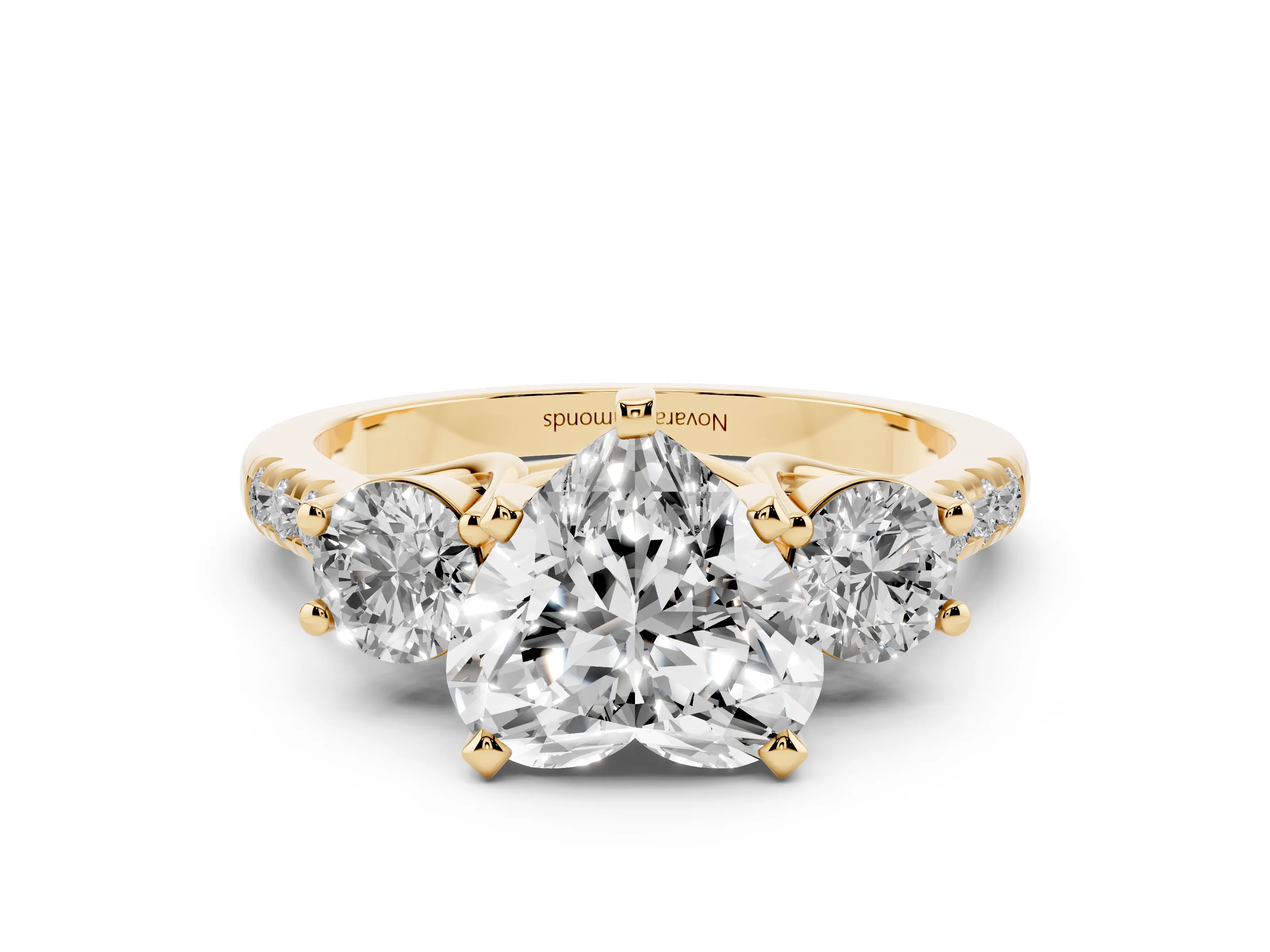 Three-Stone Heart Cut Diamond Pavé Band Ring Set in Yellow gold with Prong-Set Trio