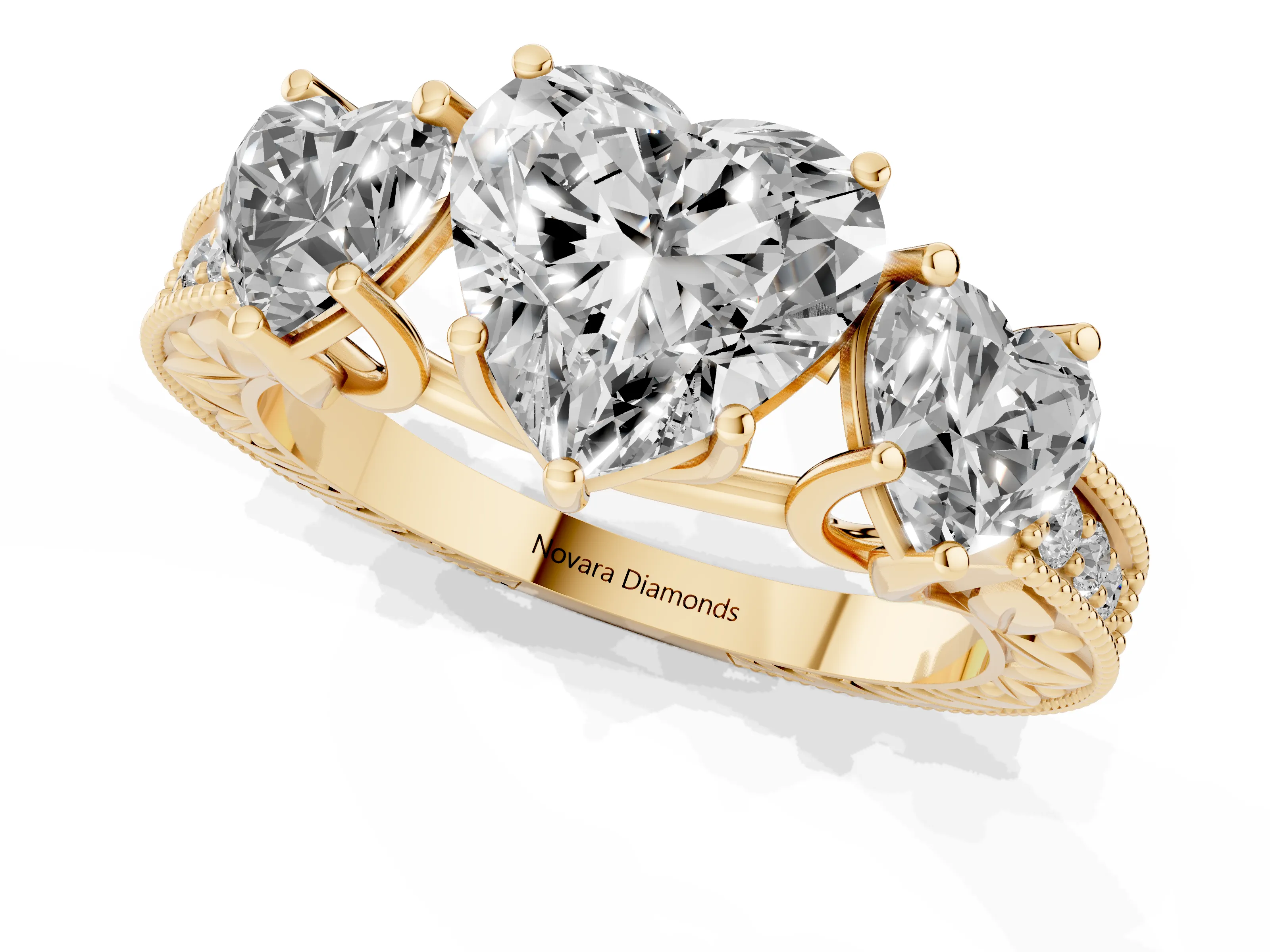 Heart Cut Diamond Three-Stone Engagement Ring Set in Yellow gold with Milgrain Pavé Band