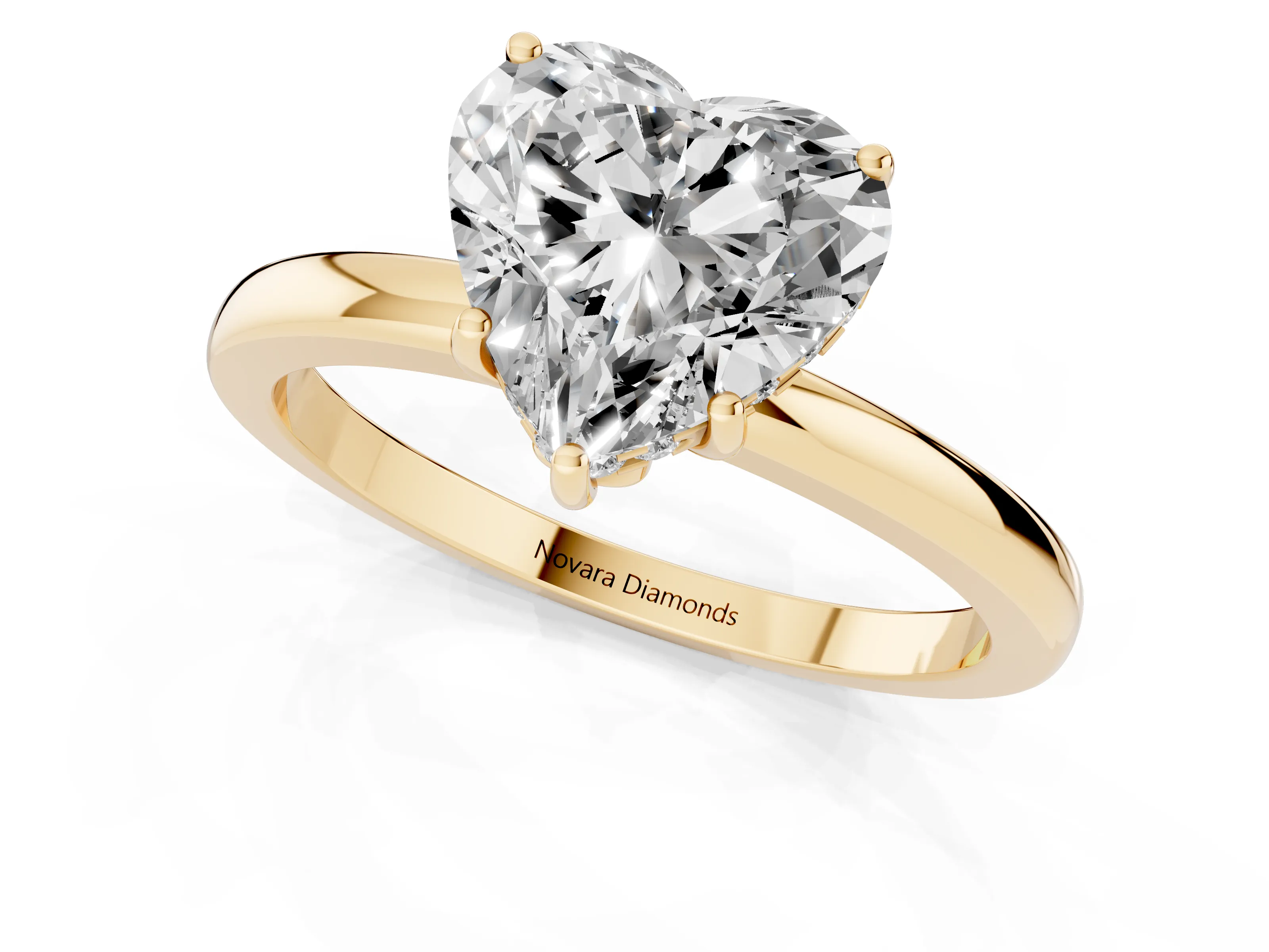 Heart Cut Diamond Solitaire Ring Set in Yellow gold with Plain Band and Prong Setting