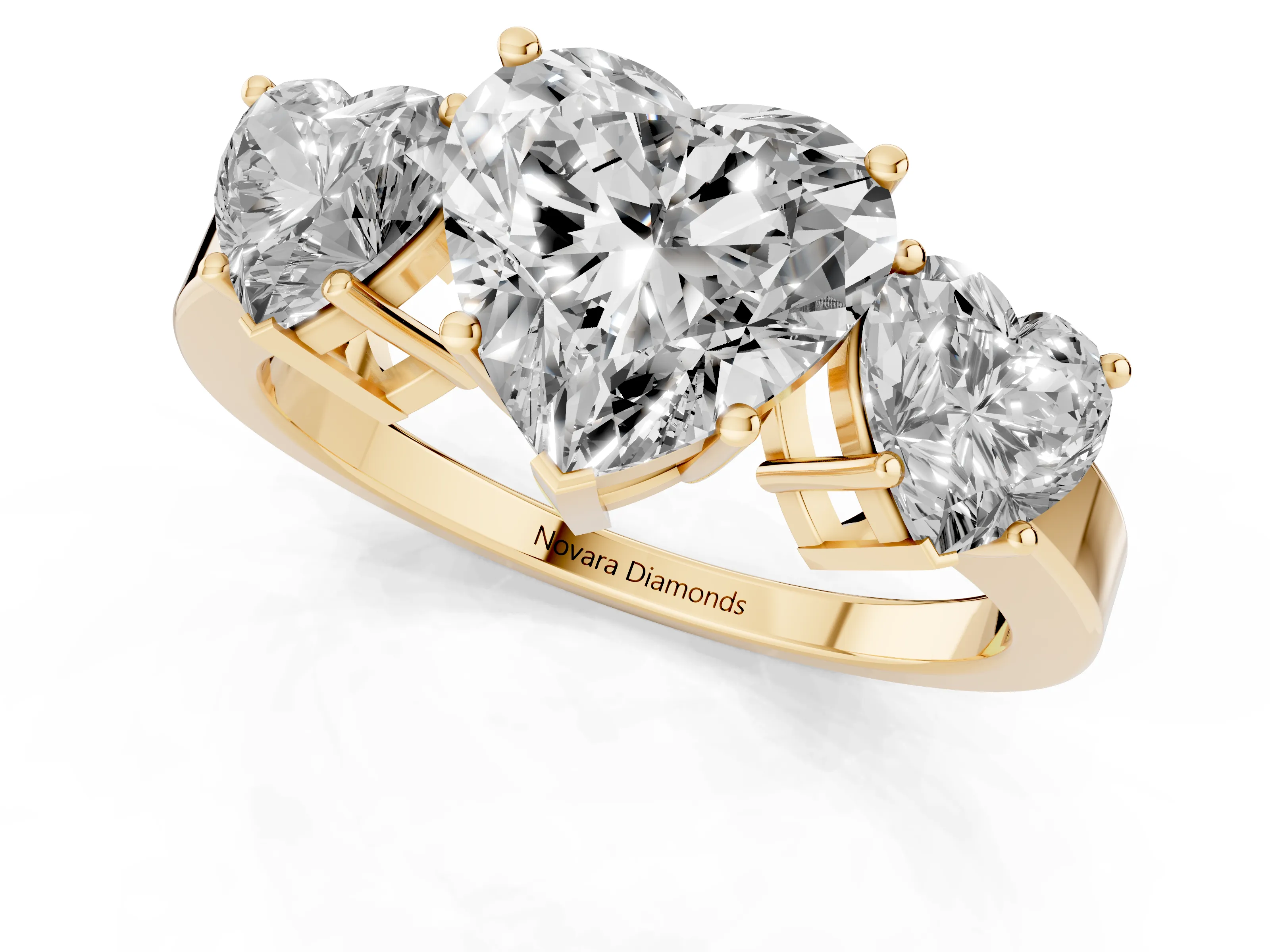 Heart Cut Diamond Three-Stone Engagement Ring Set in Yellow gold with Flat Band