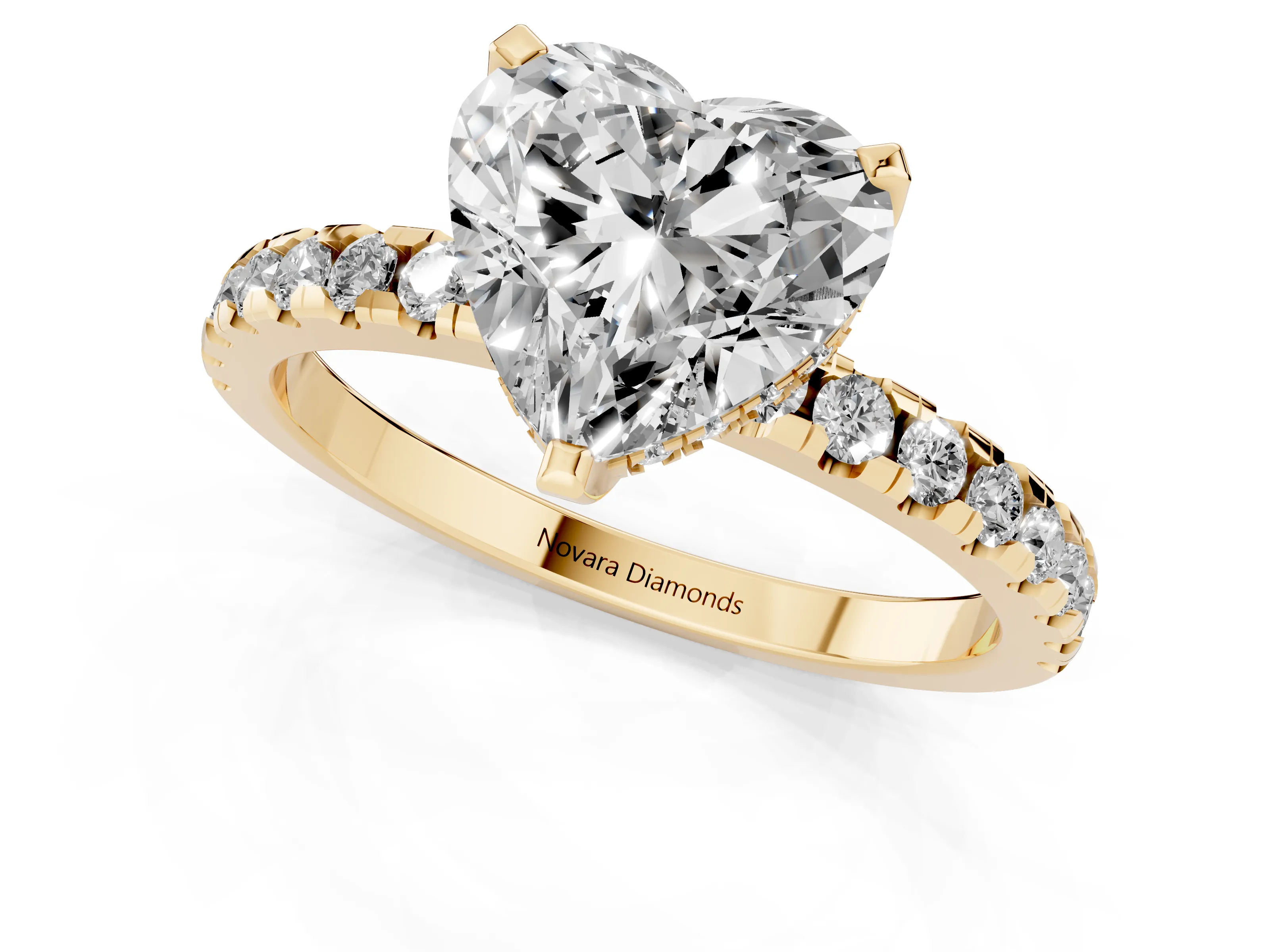 Heart Cut Diamond Pavé Solitaire Ring Set in Yellow gold with Round Band Accents and Prong Setting