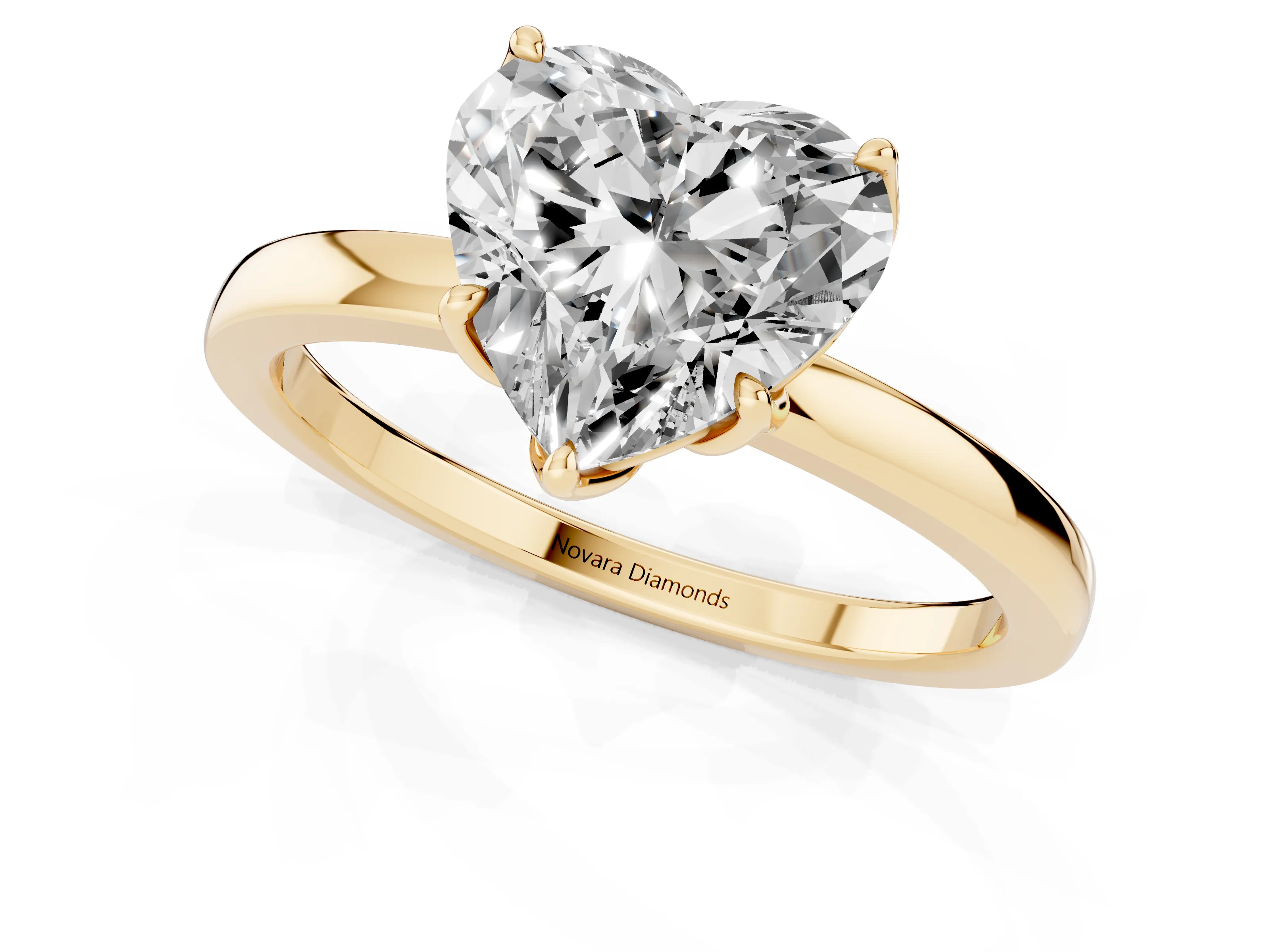 Heart Cut Diamond Solitaire Ring Set in Yellow gold with Prong Setting and Thin Polished Band