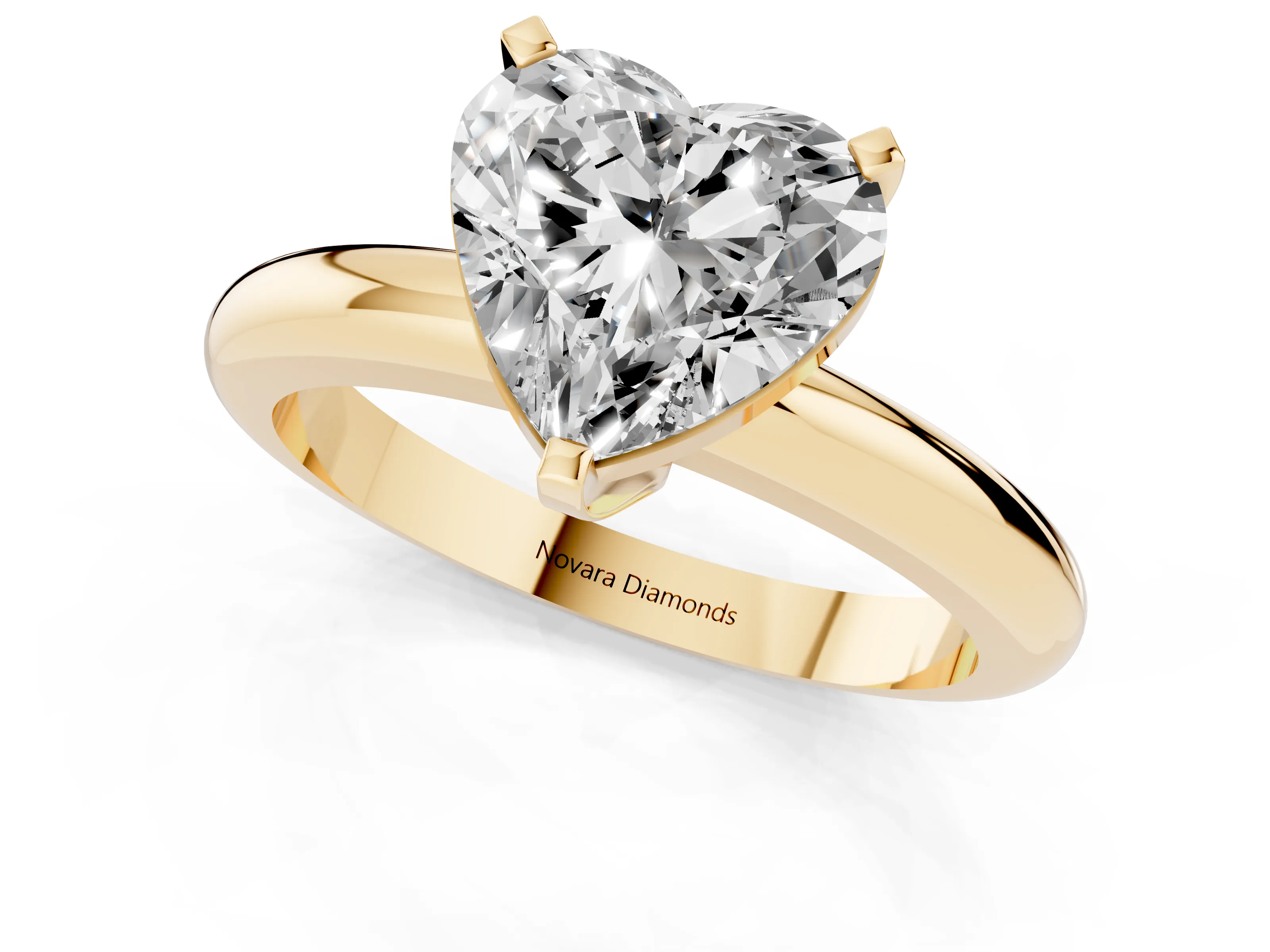 Heart Cut Diamond Solitaire Engagement Ring Set in Yellow gold with Round Band and Prong Setting