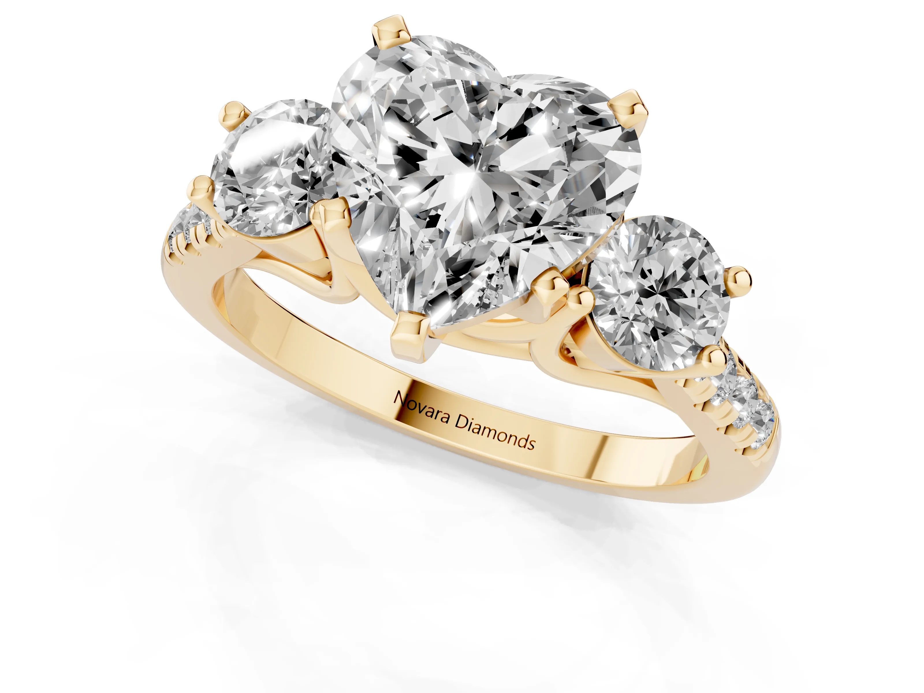 Three-Stone Heart Cut Diamond Pavé Band Ring Set in Yellow gold with Prong-Set Trio