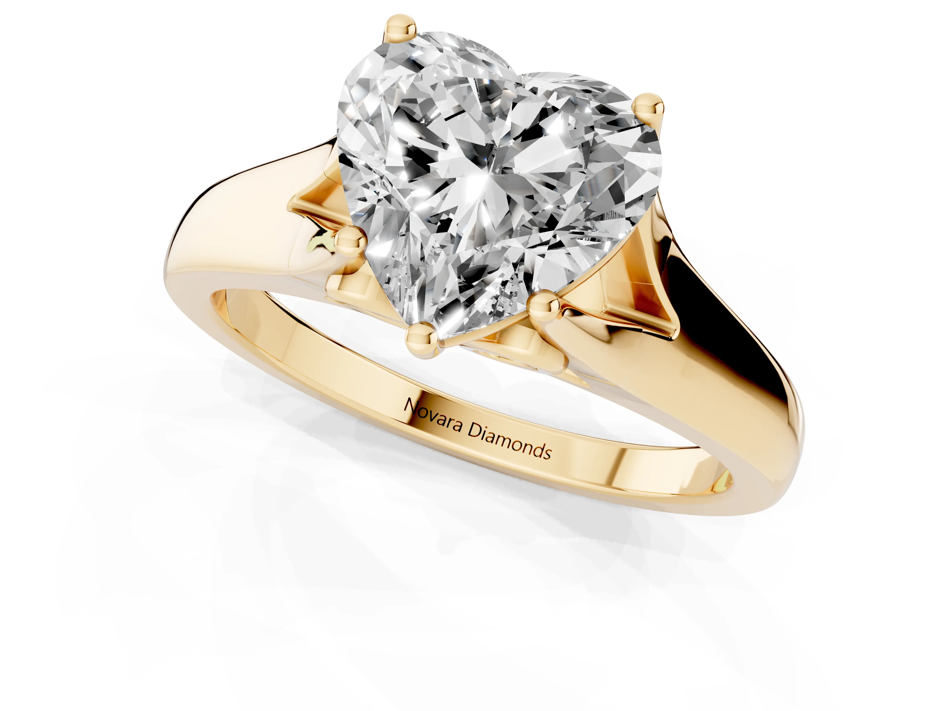 Heart Cut Diamond Solitaire Ring Set in Yellow gold with Arched Cathedral Band and Prong Setting