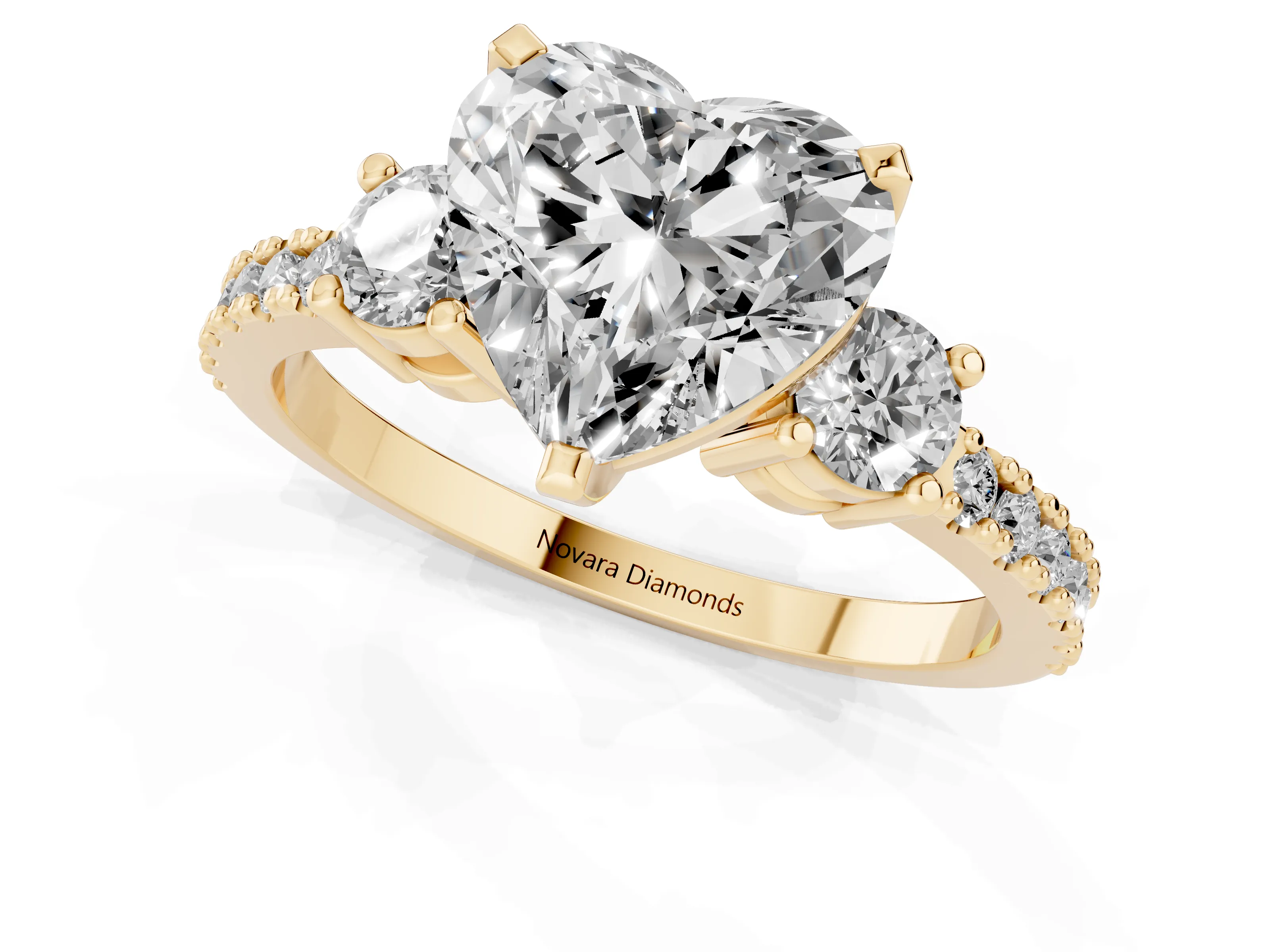 Three-Stone Heart Cut Diamond Pavé Band Ring Set in Yellow gold with Prong Setting