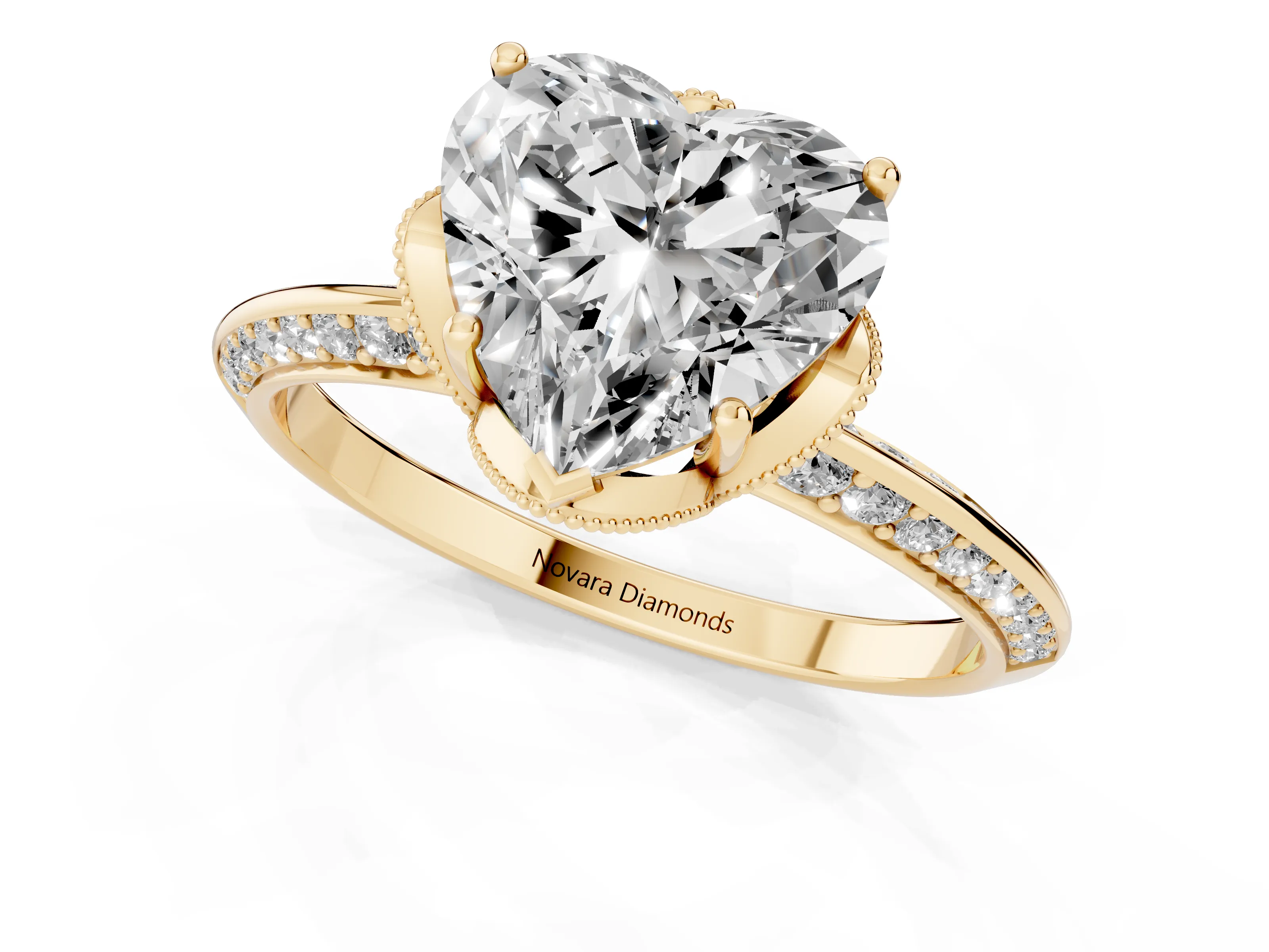 Heart Cut Diamond Solitaire Engagement Ring Set in Yellow gold with Pavé Split Shank and Prong Setting