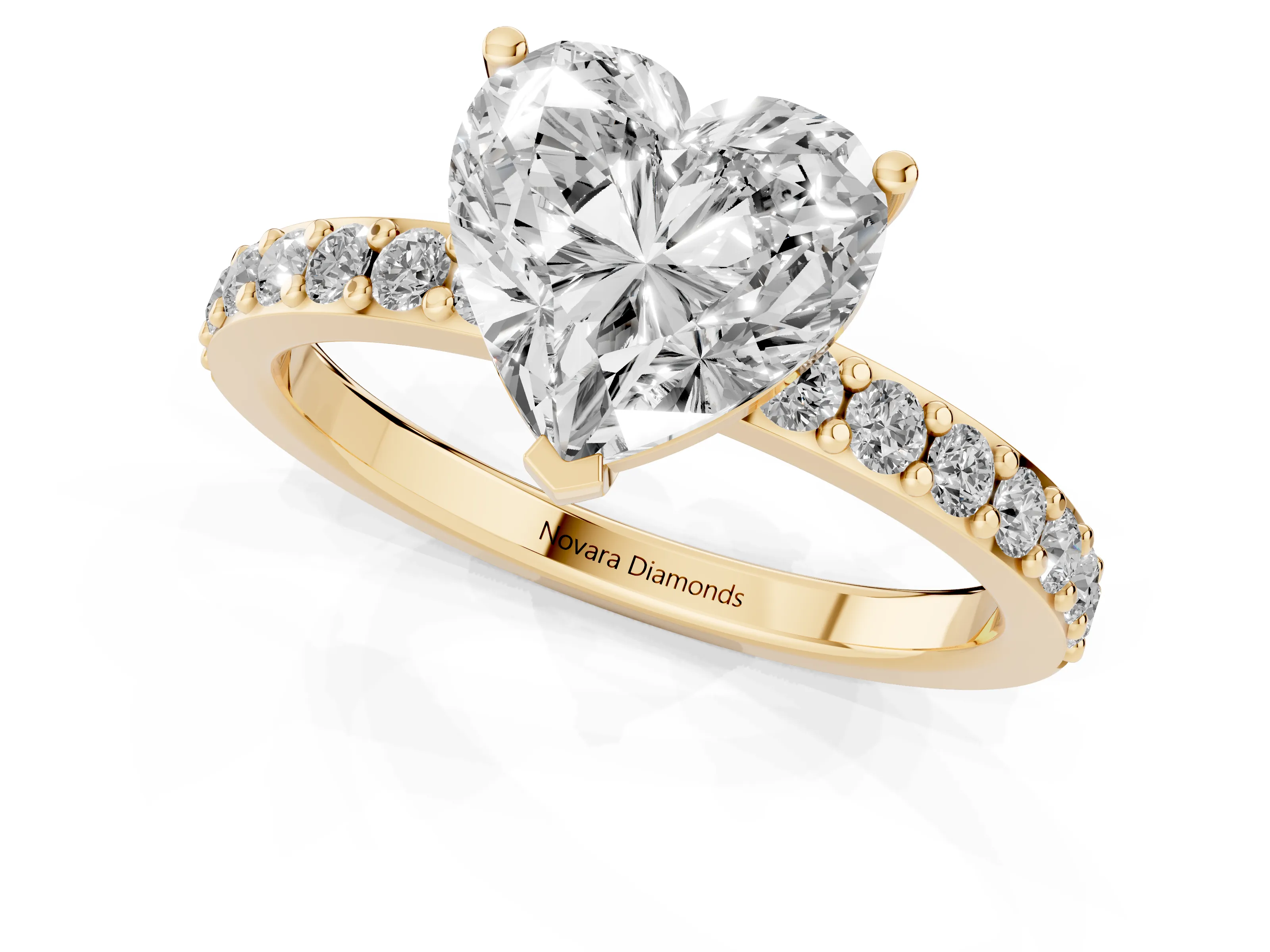 Heart Cut Diamond Solitaire Set in Yellow gold with Round Pavé Band and Prong Setting