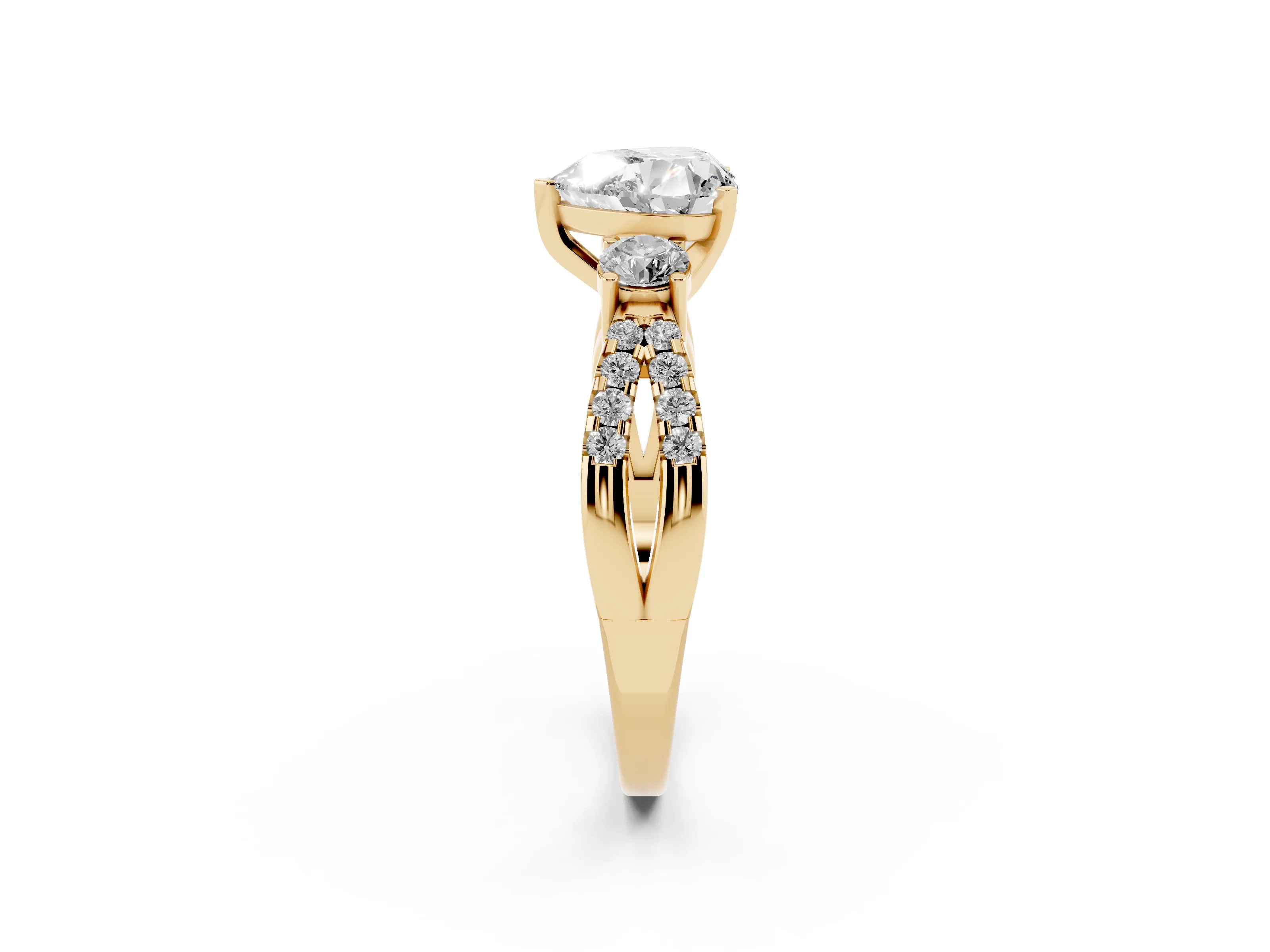 Heart Cut Diamond Three-Stone Ring Set in Yellow gold with Pavé Split Shank and Prong Setting