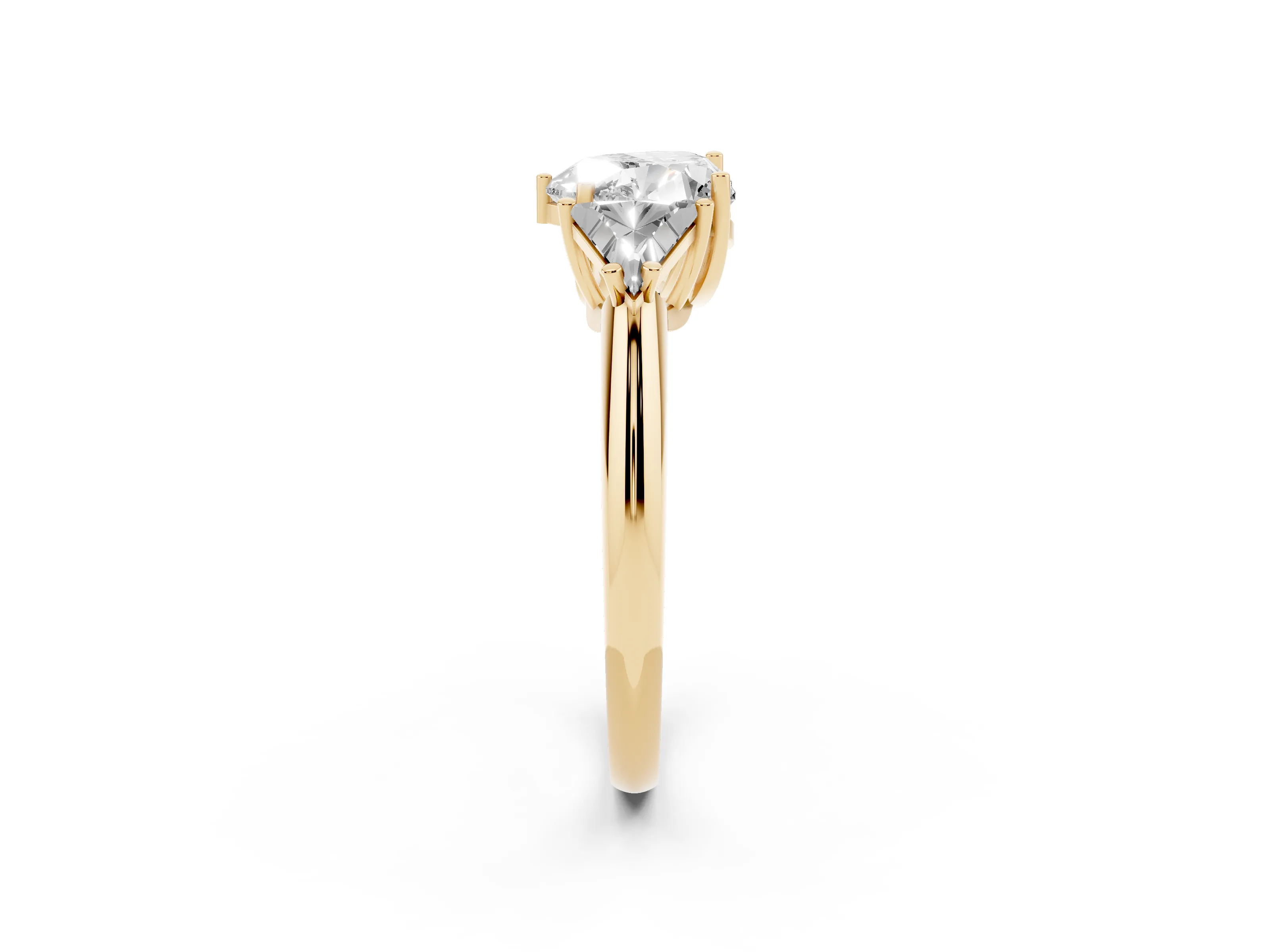 Heart Cut Diamond Three-Stone Engagement Ring Set in Yellow gold with Trillion Side Stones