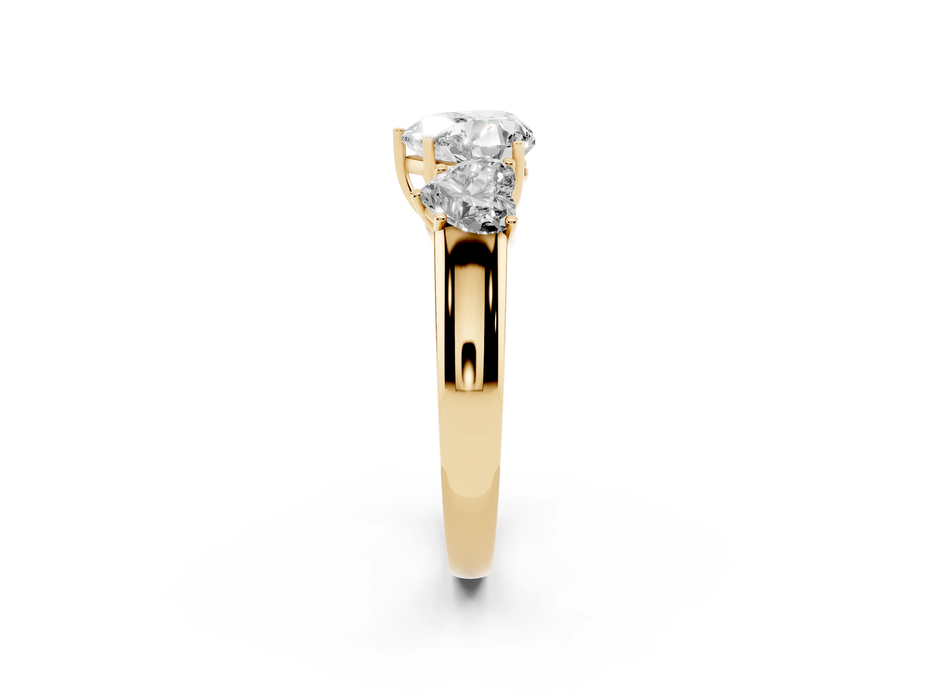 Three-Stone Heart Cut Diamond Ring Set in Yellow gold with Matching Prong Settings and Plain Band