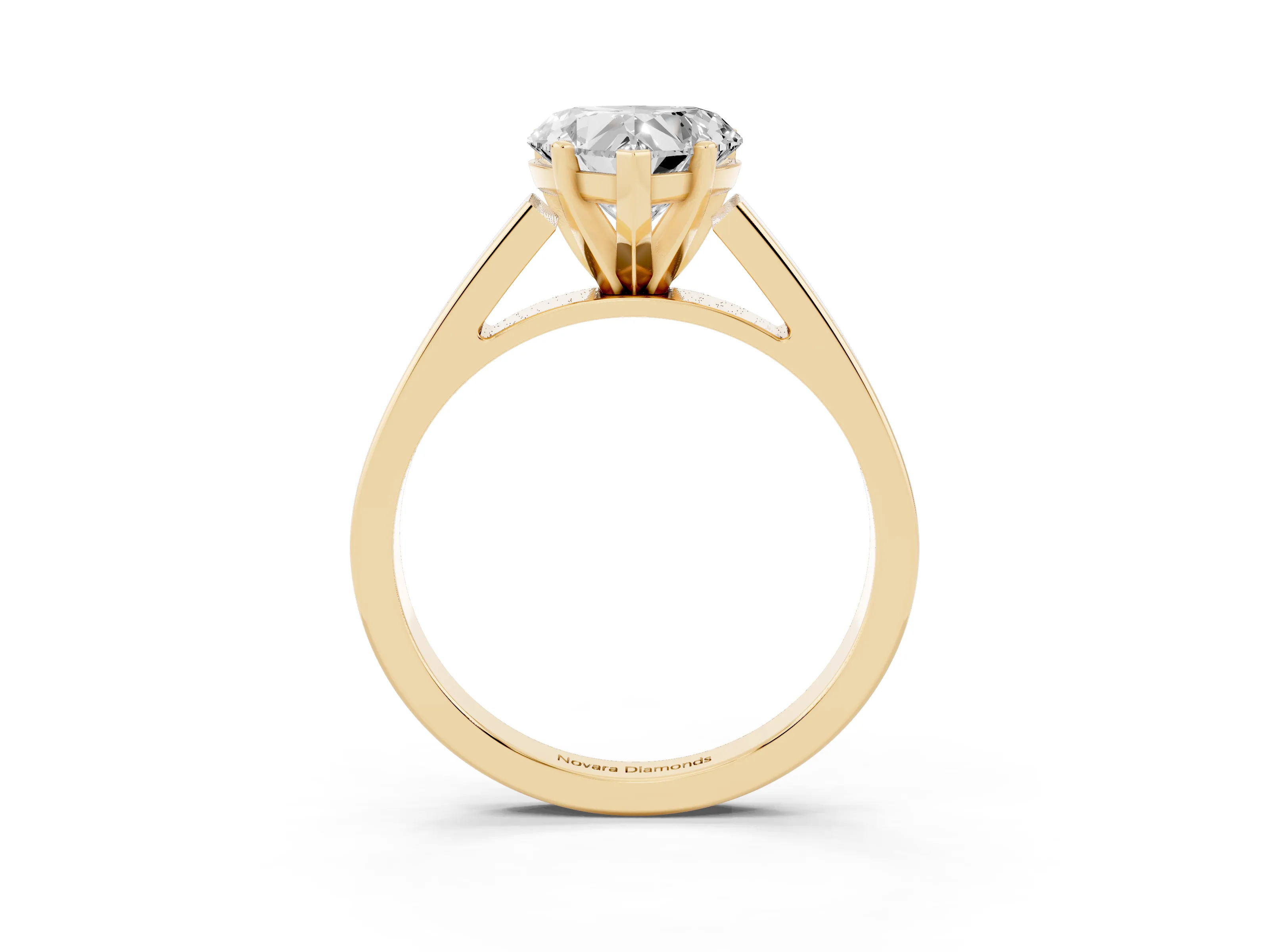 Heart Cut Diamond Solitaire Engagement Ring Set in Yellow gold with Prong Setting and Tapered Band