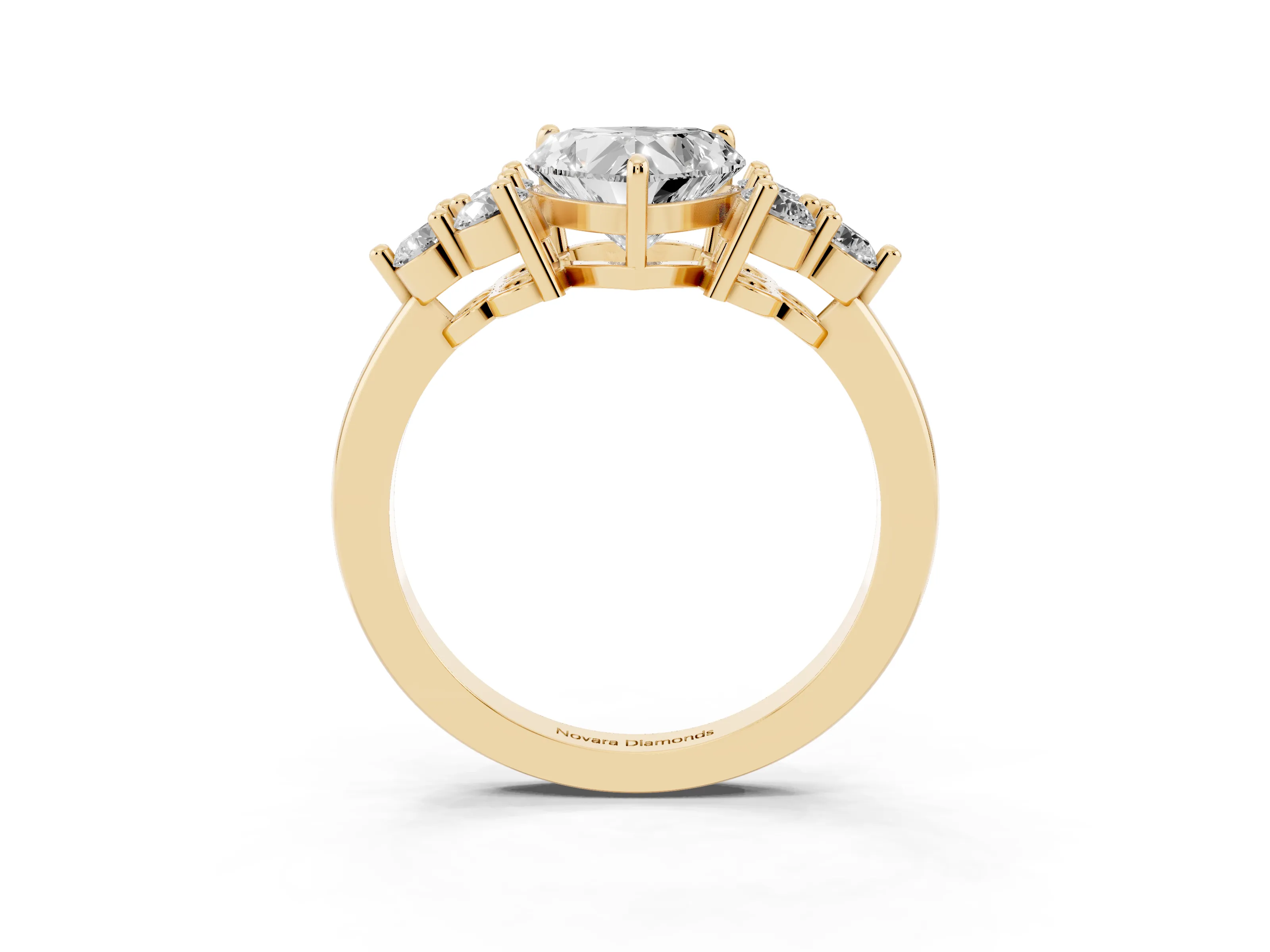 Heart Cut Diamond Solitaire Ring Set in Yellow gold with Cluster Accents on Each Side