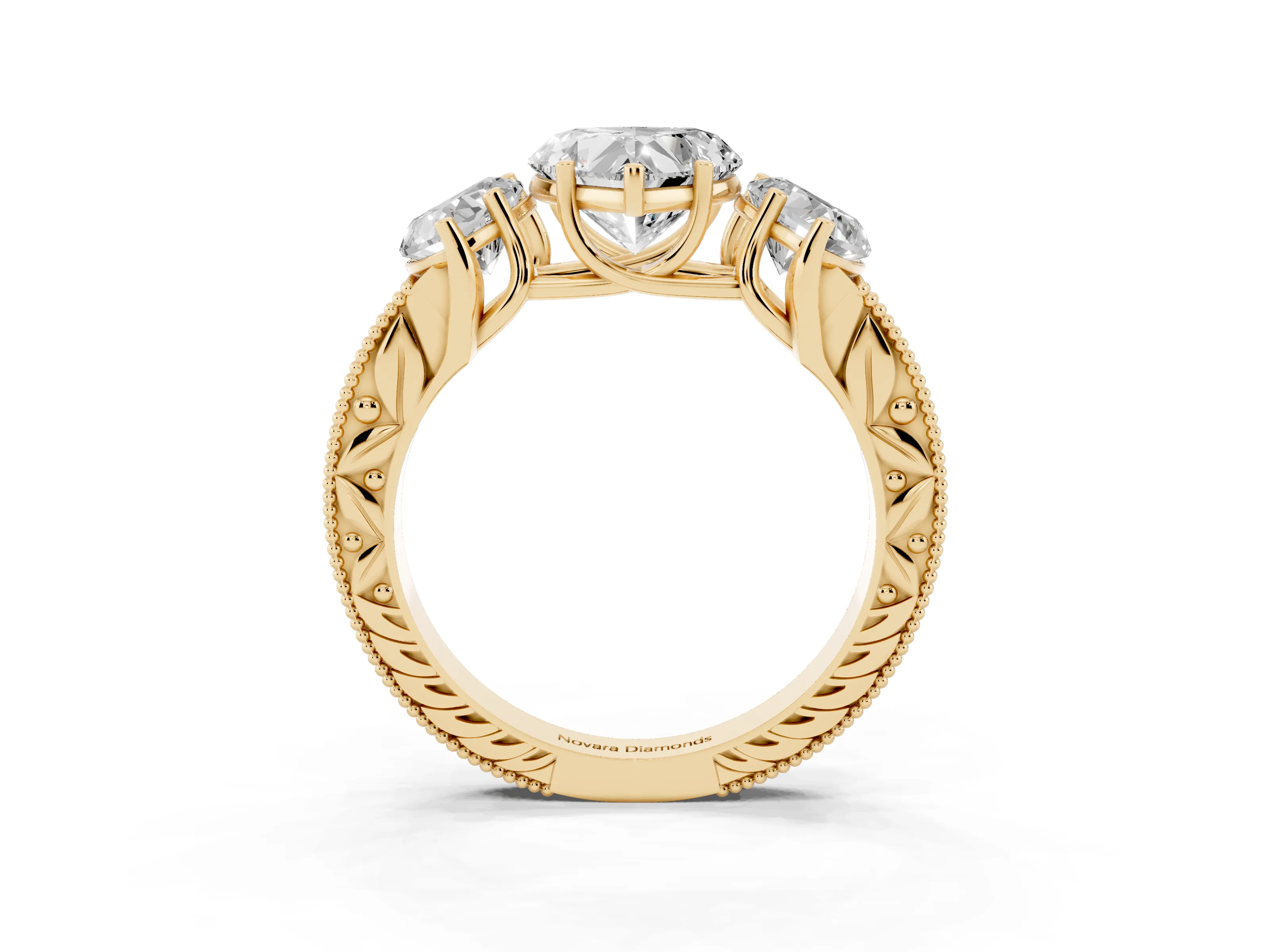 Heart Cut Diamond Three-Stone Engagement Ring Set in Yellow gold with Milgrain Pavé Band