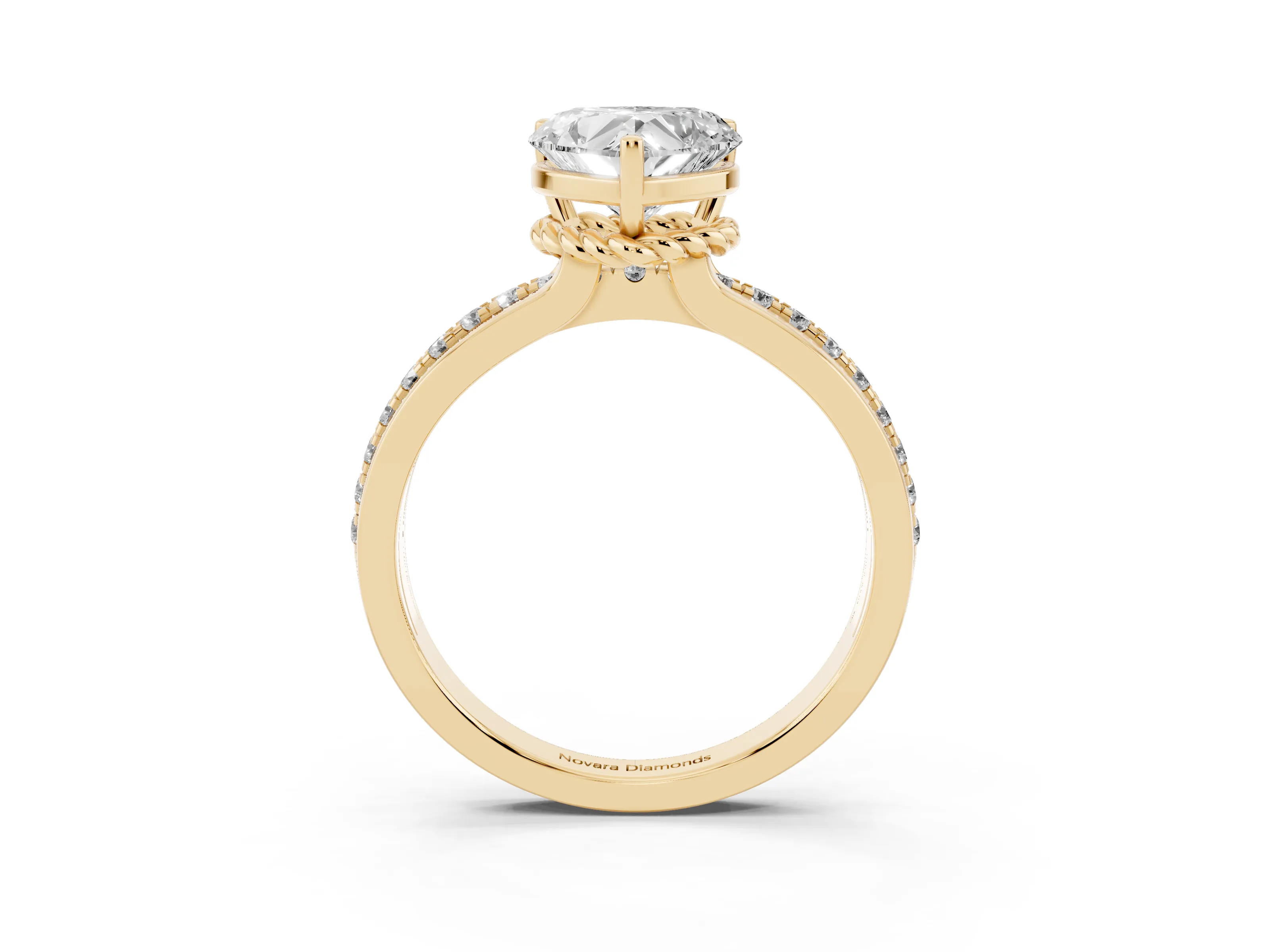 Heart Cut Diamond Solitaire Ring Set in Yellow gold with Channel Set Band and Prong Setting