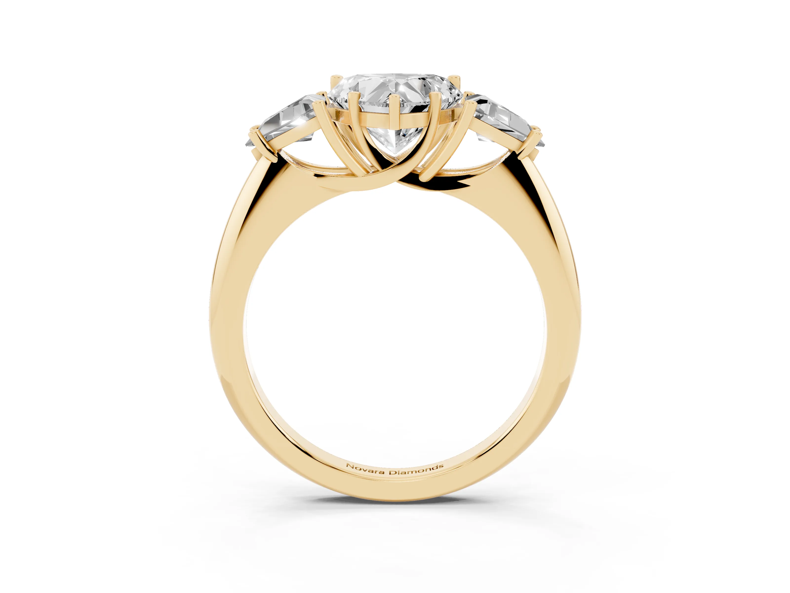 Heart Cut Diamond Three-Stone Engagement Ring Set in Yellow gold with Trillion Side Stones