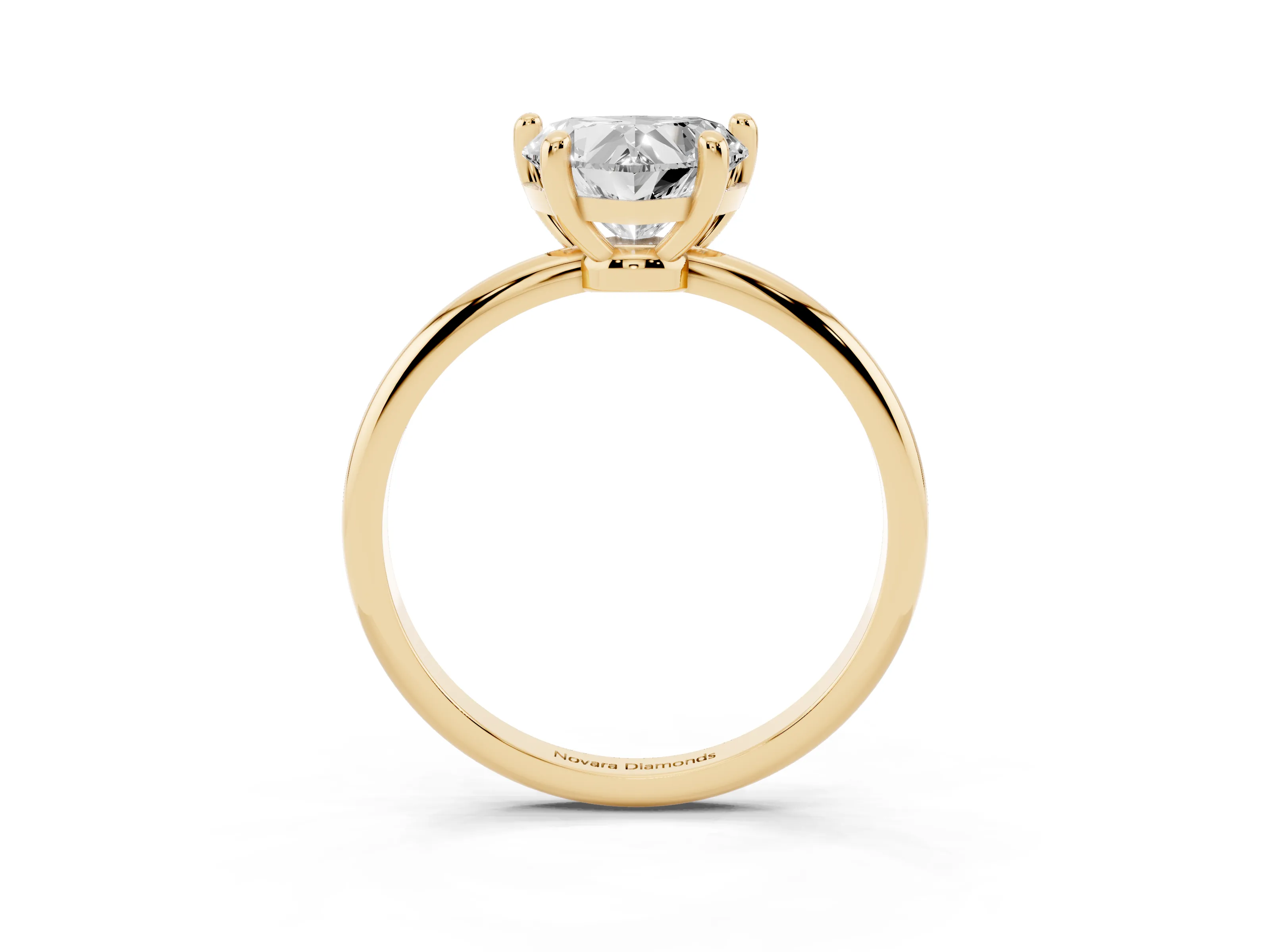 Heart Cut Diamond Solitaire Ring Set in Yellow gold with Secure Prong Setting on a Classic Band