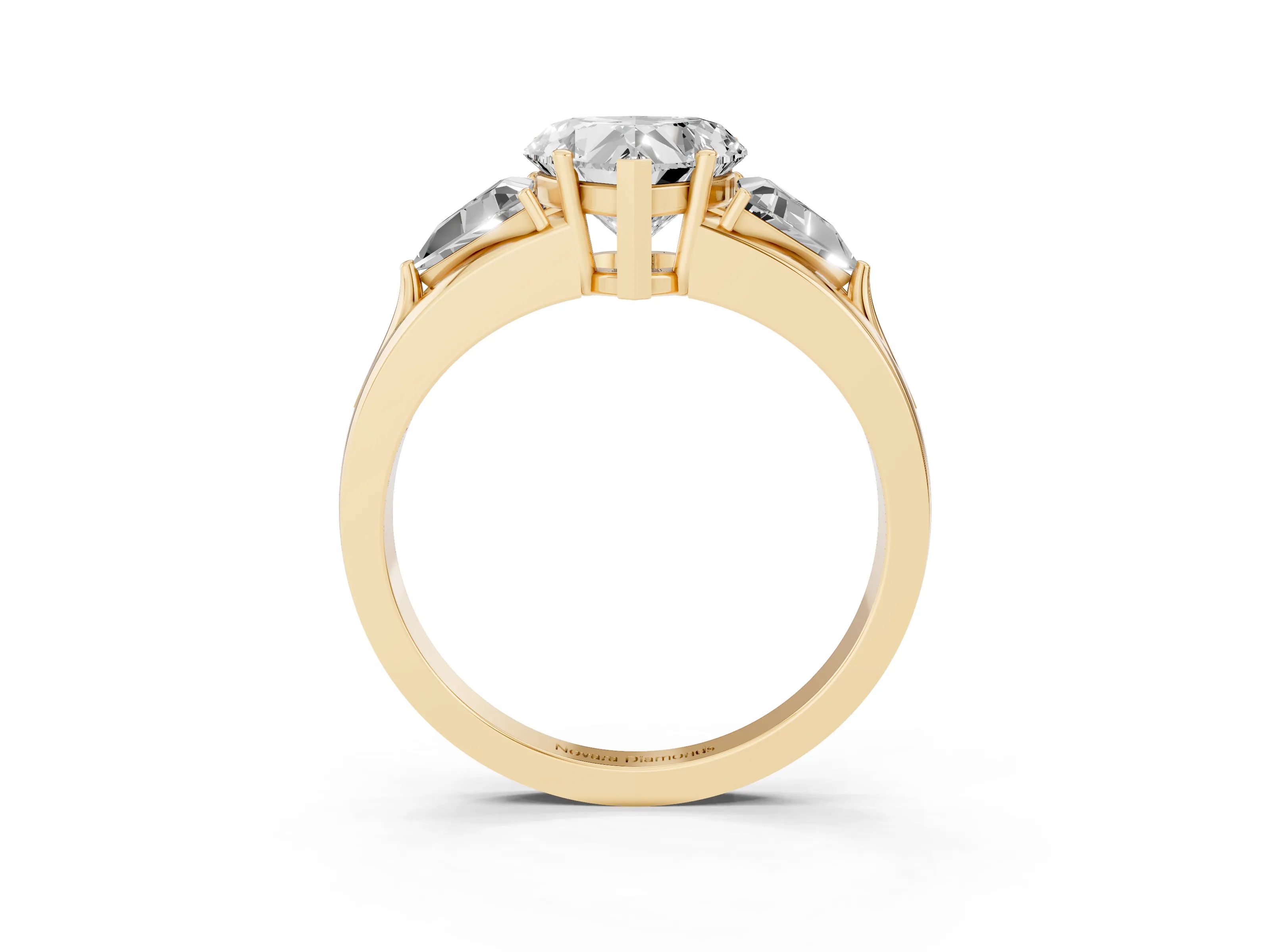 Heart Cut Diamond Three-Stone Ring Set in Yellow gold with Trillion Side Stones and Split Shank