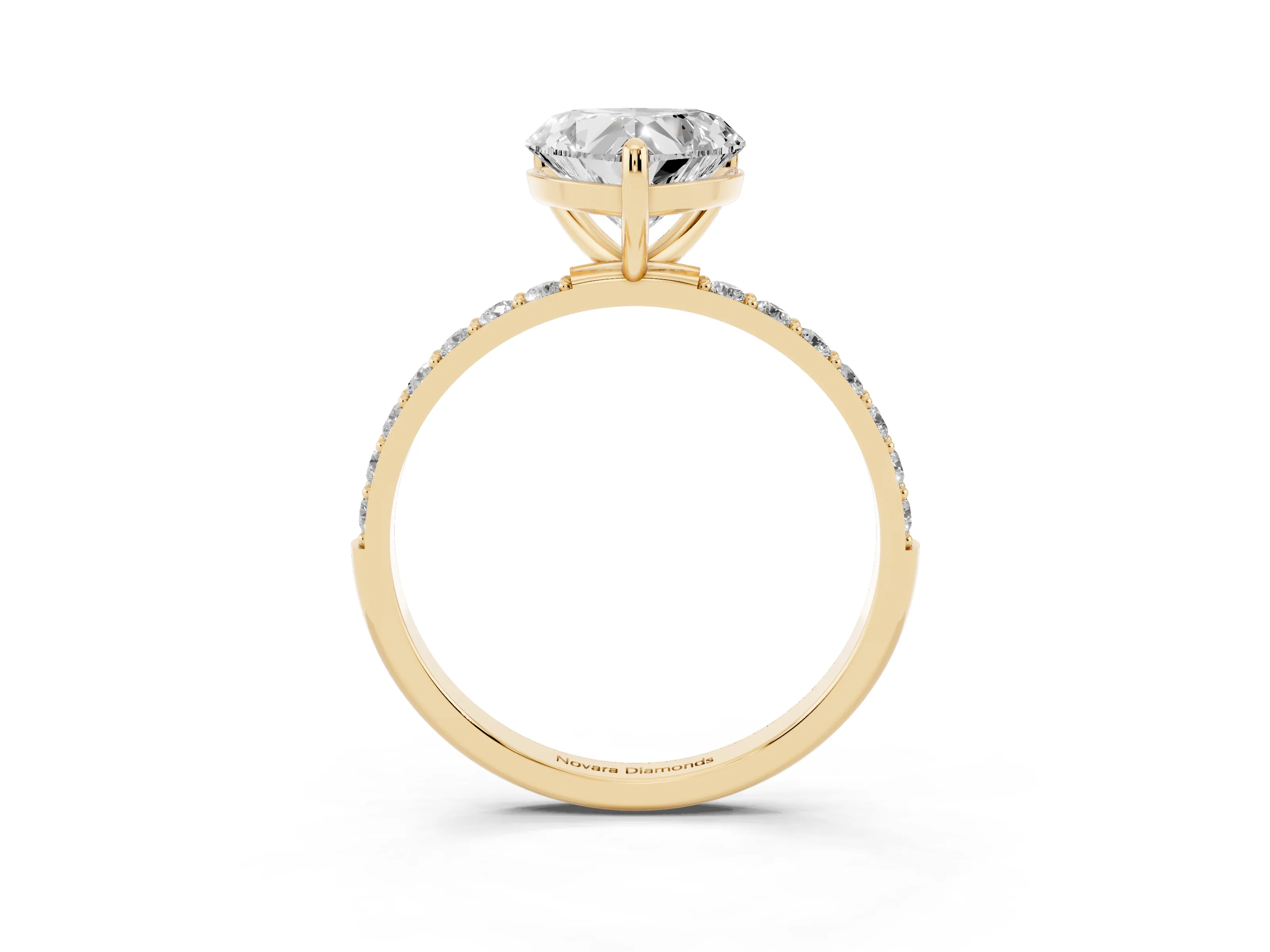 Heart Cut Diamond Solitaire Ring Set in Yellow gold with Round Pavé Band and Prong Setting